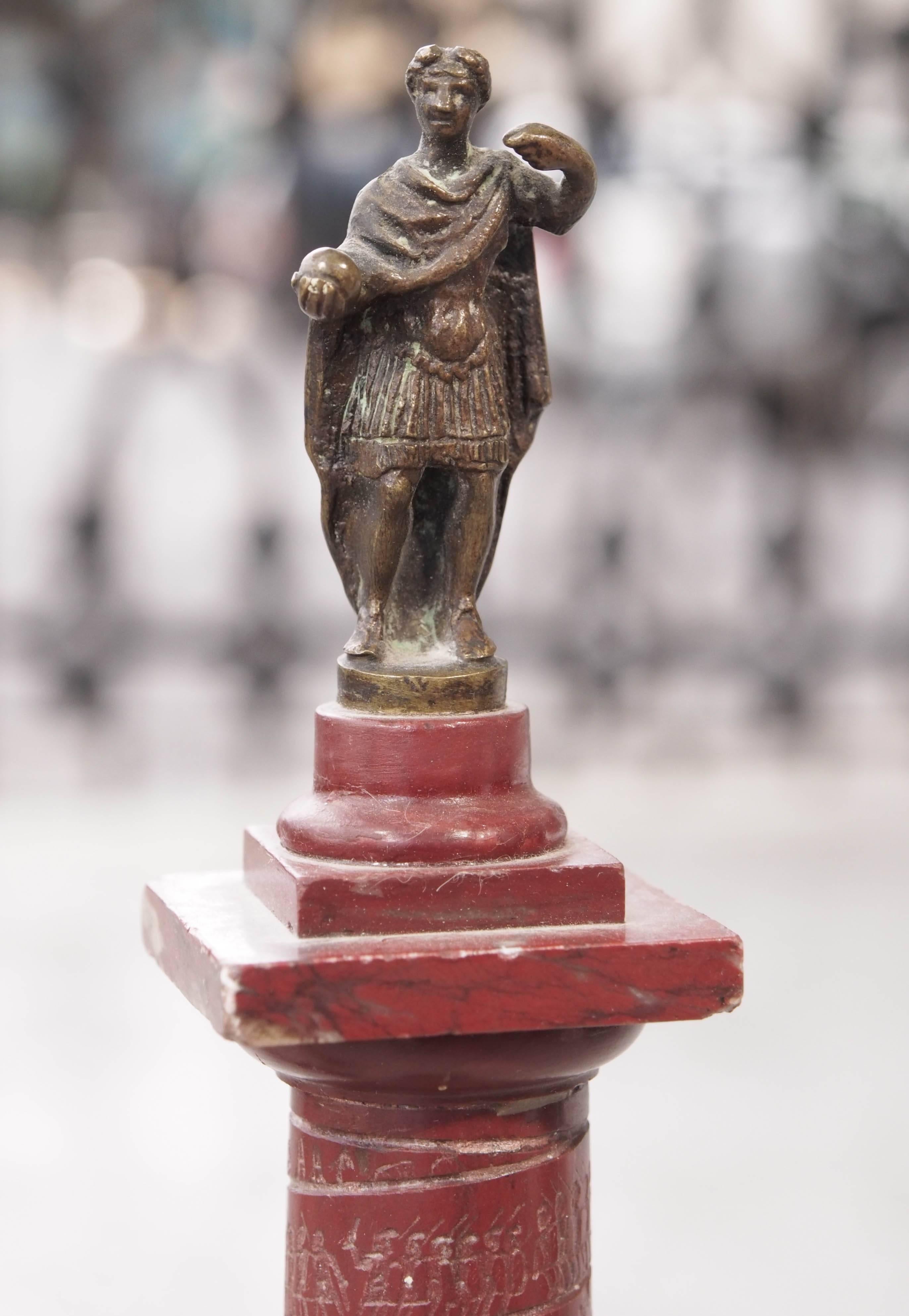 Three rouge marble and bronze Tajan column Grand Tour souvenirs.
One has a repaired corner of the back marble base. Several small rough places. Call for specific condition report.