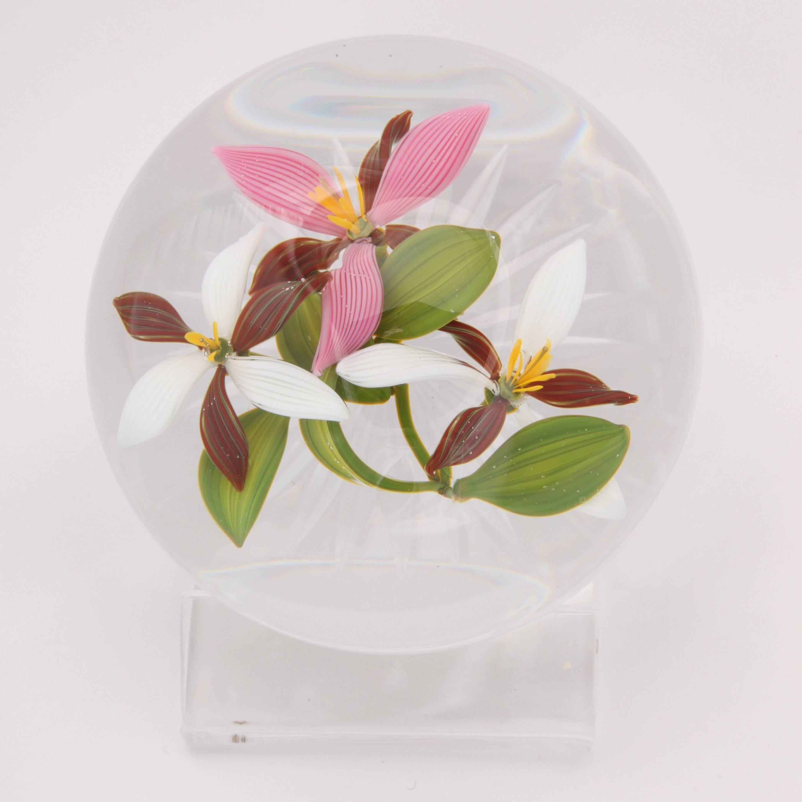 A Beautiful Gordon Smith bouquet paperweight with red and white and pink triliums on a star cut base, signed GES 2015