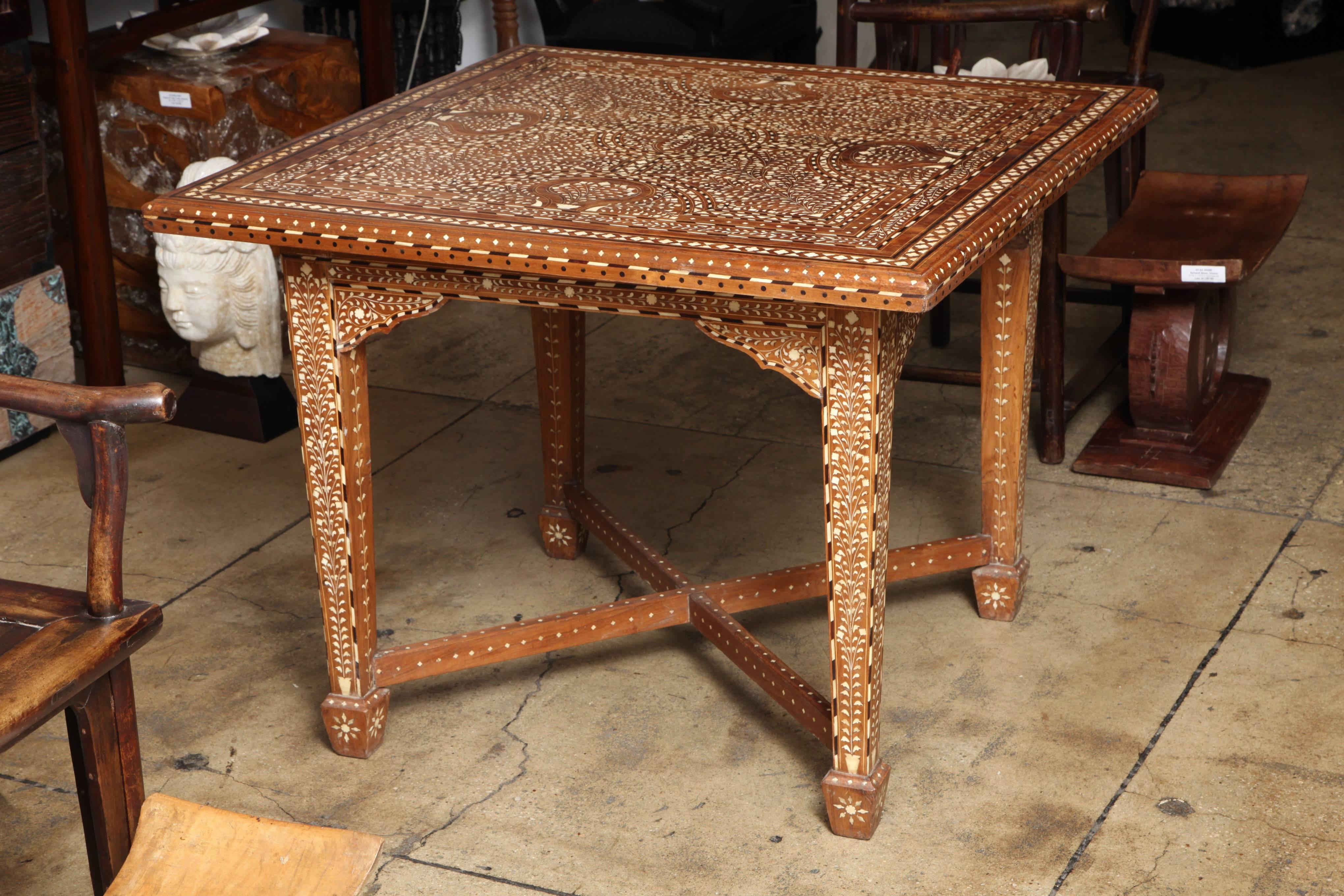 A square bone inlaid table from India with Classic patterns.