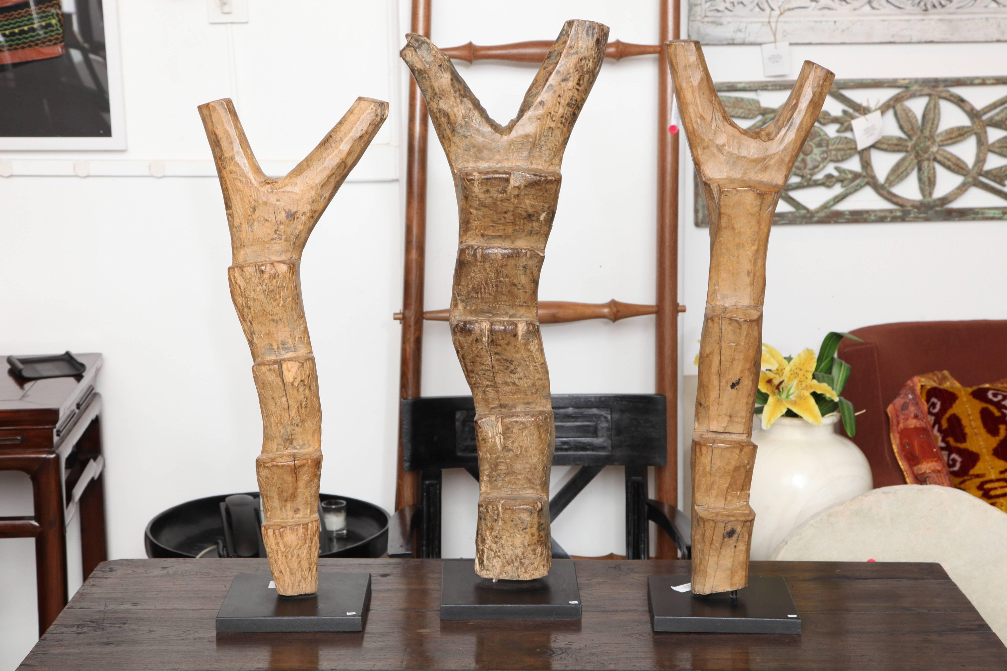 A selection of model Dogon ladders, mounted. Replicas of mush larger hand-hewn ladders traditionally used by the Dogon peoples of Mali to access cliff Dwellings. Dimensions vary. Tallest dimensions shown below. Sold separately.