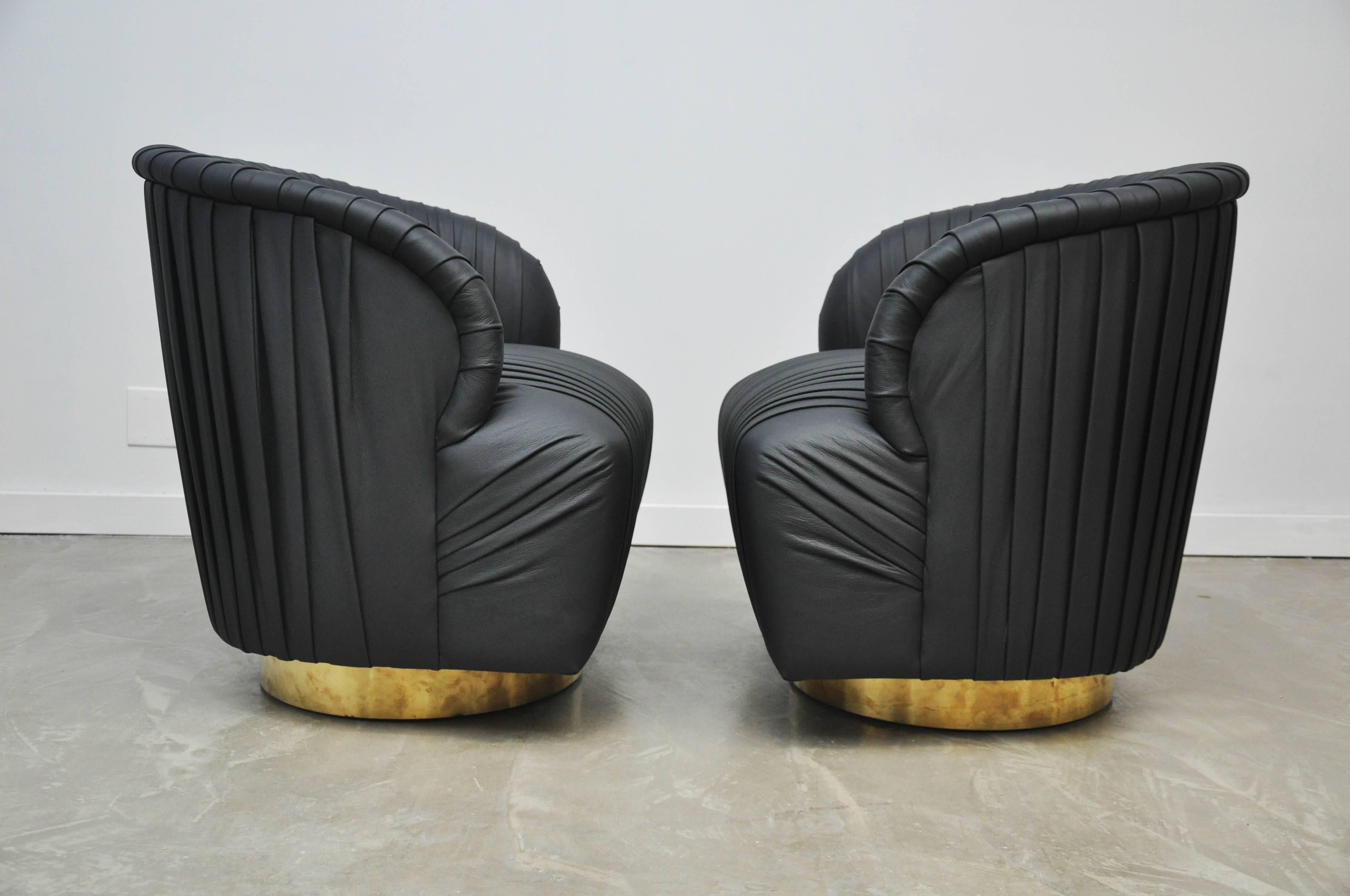 American Pleated Leather and Brass Swivel Chairs