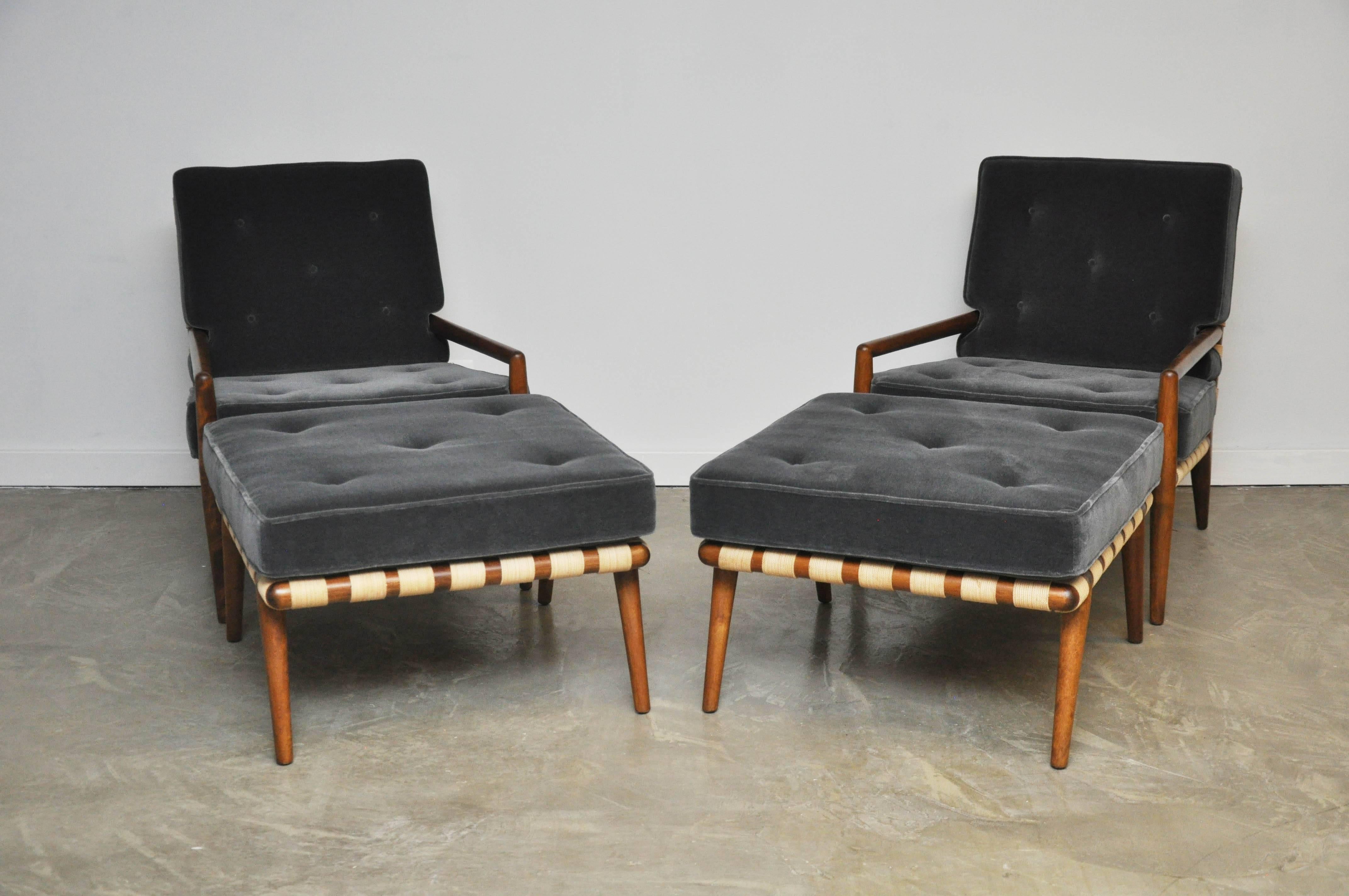 Pair of strap frame lounge chairs with ottomans. Designed by T.H. Robsjohn-Gibbings. Beautiful original condition frames and straps with new mohair cushions.