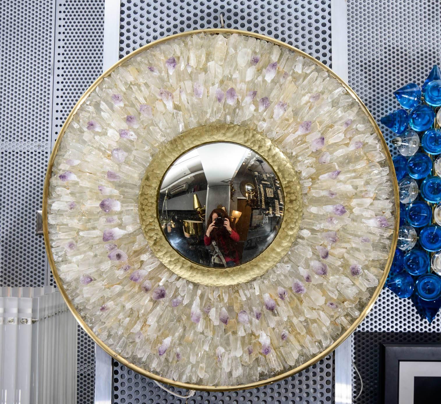 Brass lighted mirror with inclusion of amethyst and rock crystal.
 