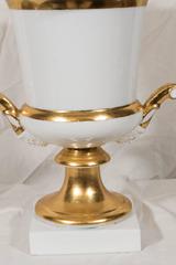 Pair of Neoclassical White and Gold Paris Porcelain Urns