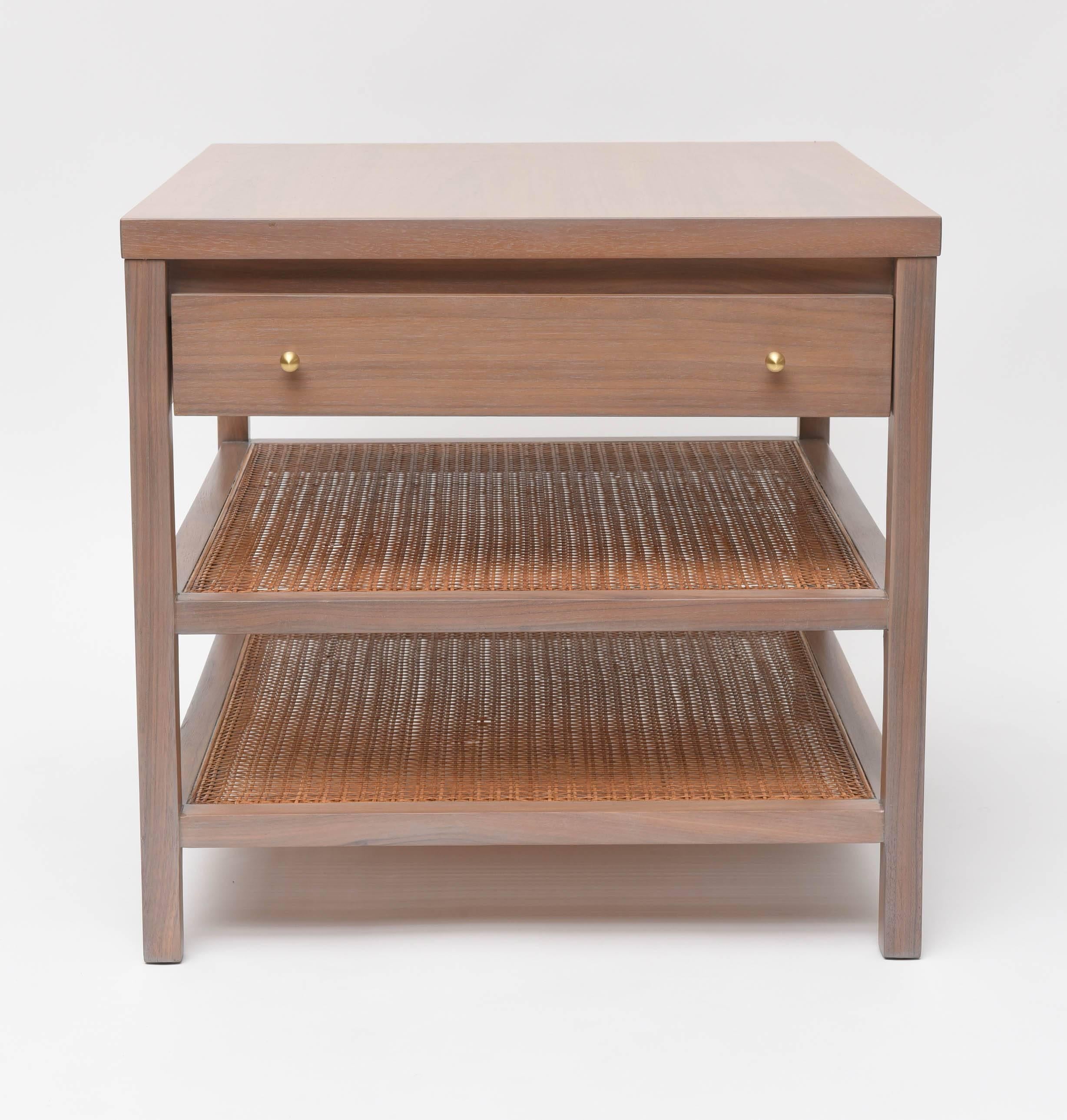Small side table by Paul McCobb for Calvin. We've re-finished the walnut frame in our signature 