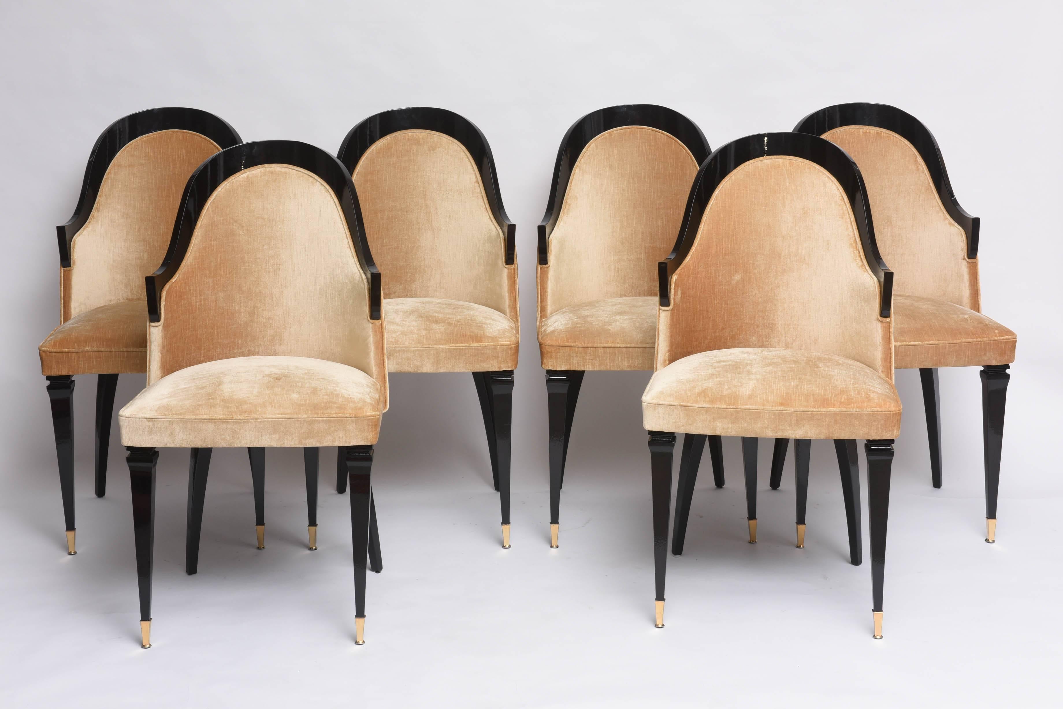 This set of Art Deco style dining chairs were purchased in France and are in the style of the 