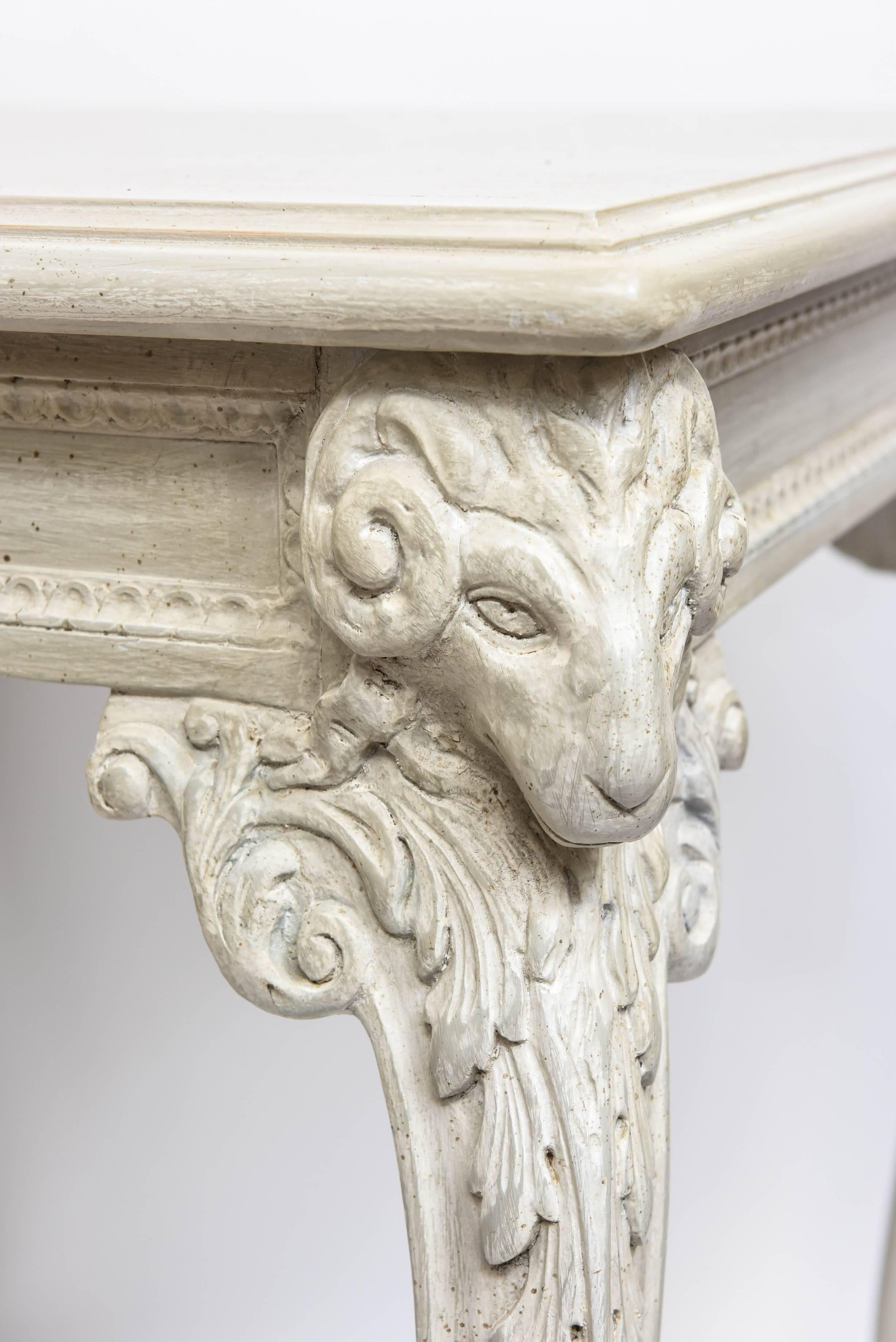 Handsome Neoclassical style square painted wood ram's head and hoof foot side table.
