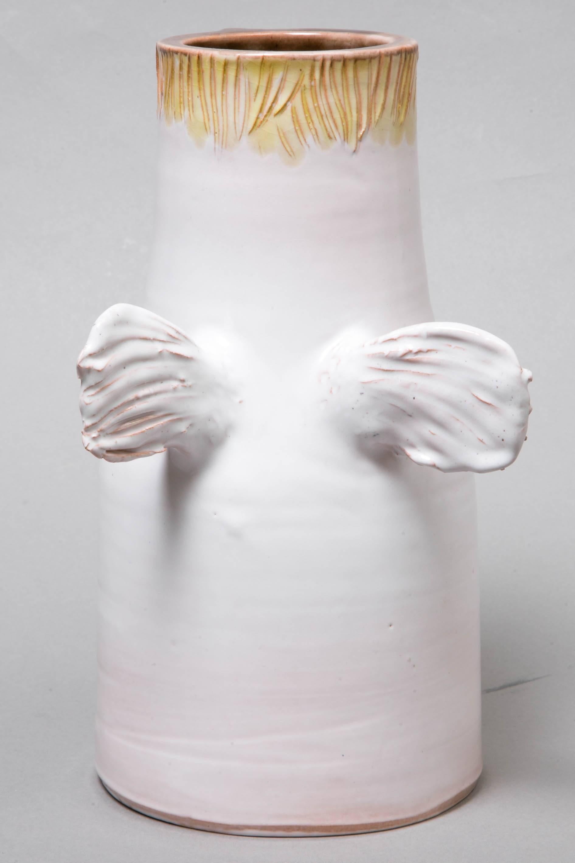 Enameled White Winged Vase with a Face, circa 1965, by the Cloutier Brothers For Sale