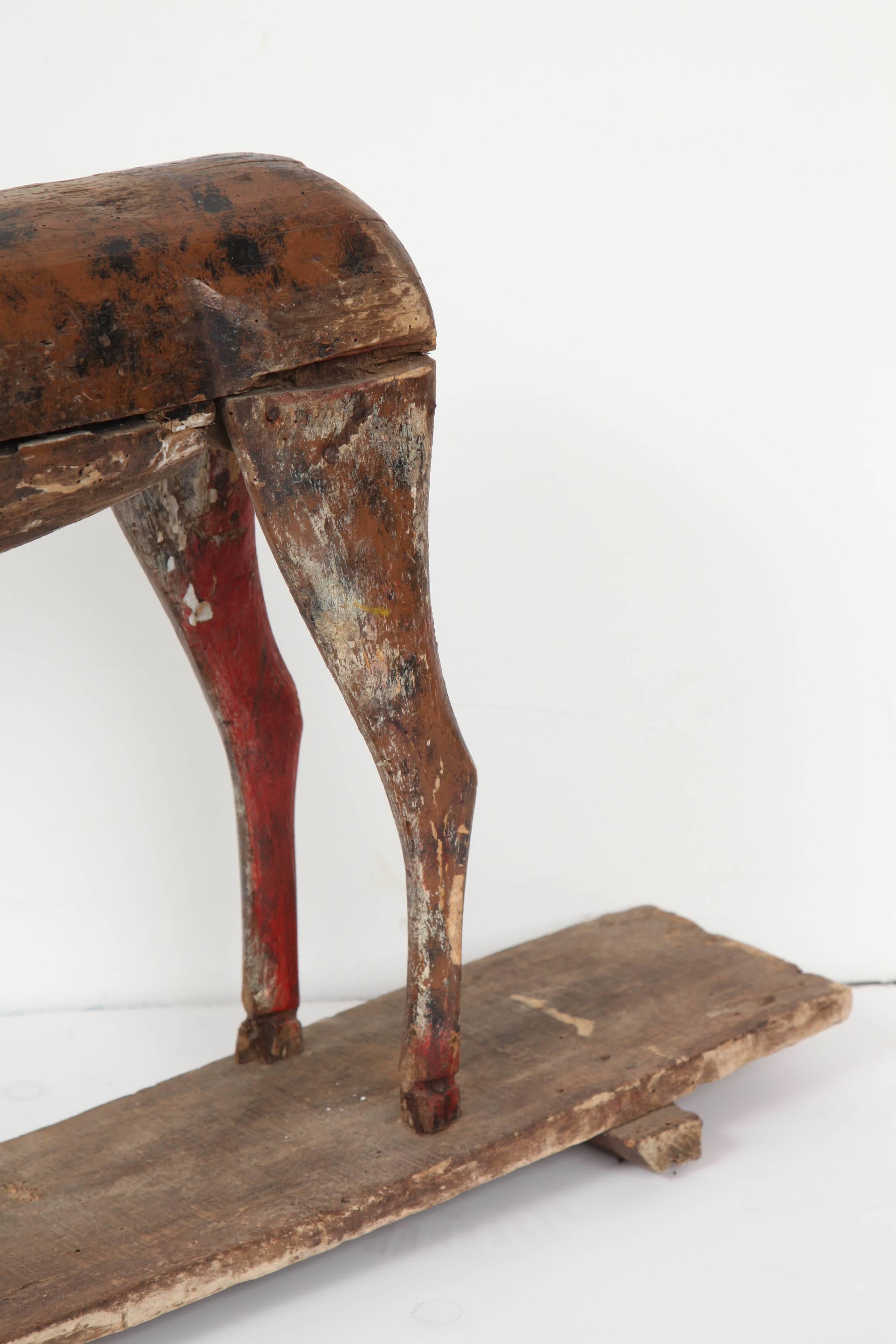 Carved Wooden and Painted Toy Horse In Distressed Condition In New York, NY