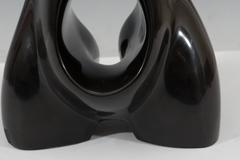 Sculpture of an Abstracted Female Torso in Black Marble