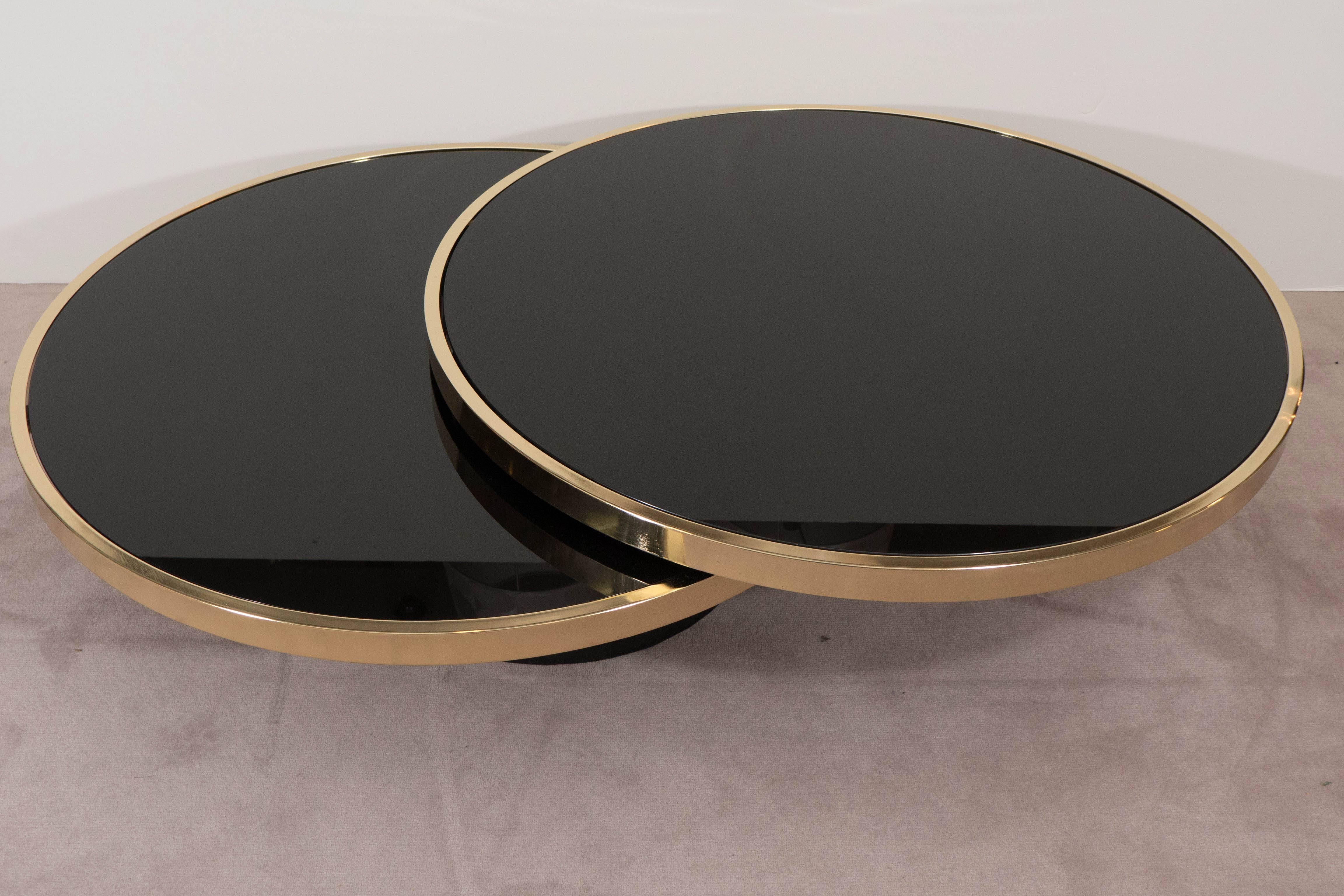 Black Glass and Brass Swivel Cocktail Table by the Design Institute of America In Good Condition In New York, NY