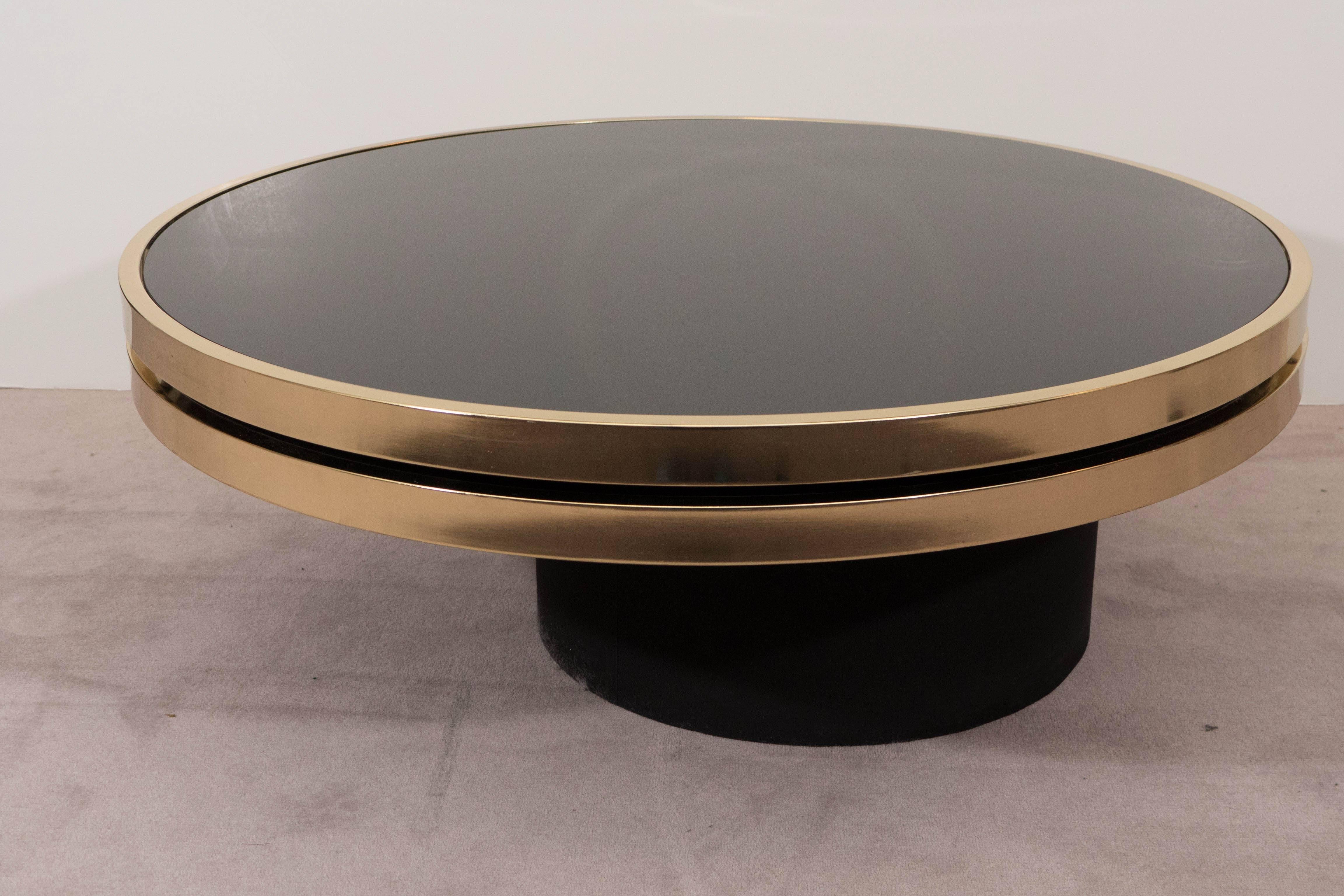 Late 20th Century Black Glass and Brass Swivel Cocktail Table by the Design Institute of America