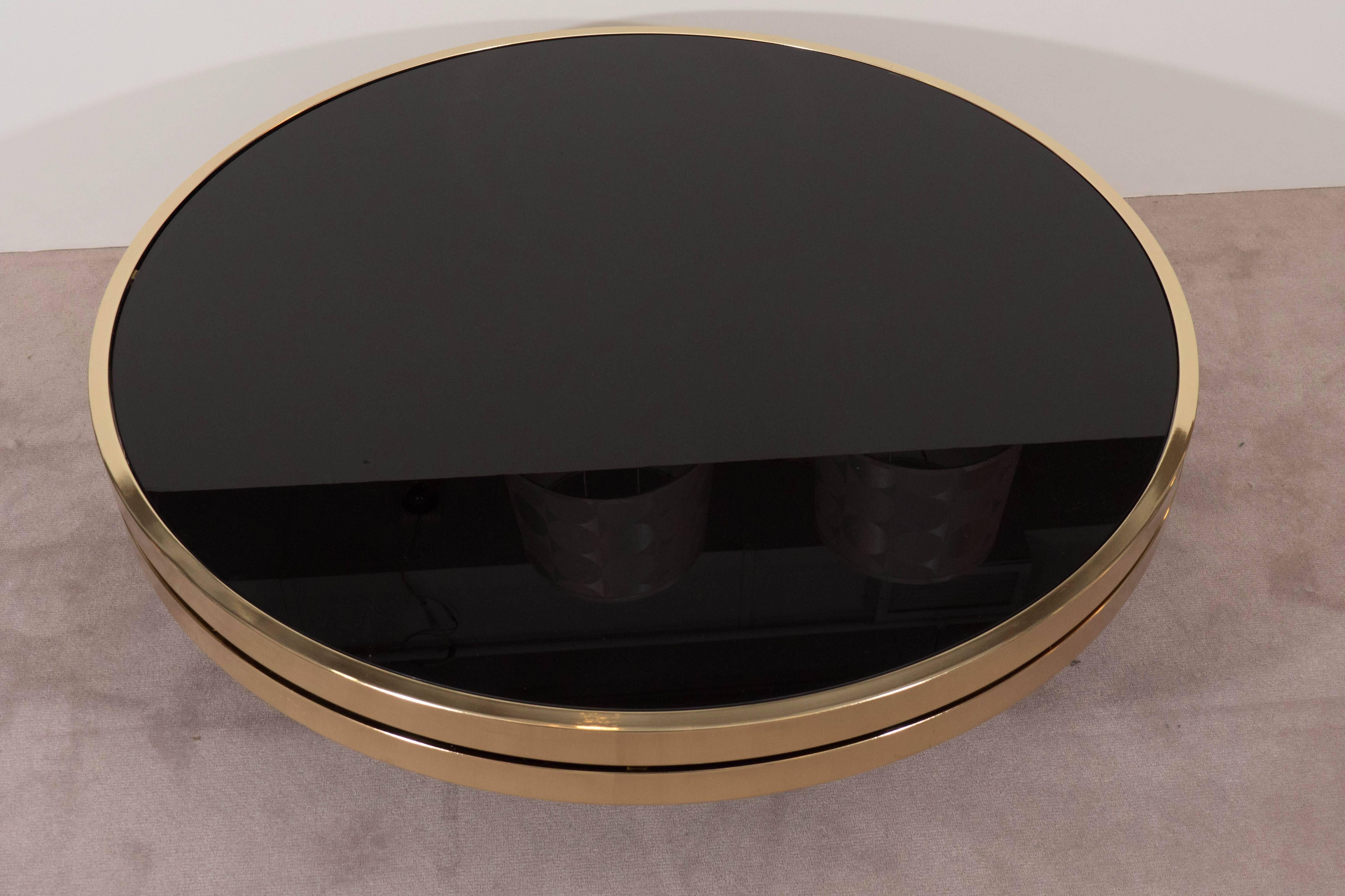 Black Glass and Brass Swivel Cocktail Table by the Design Institute of America 1