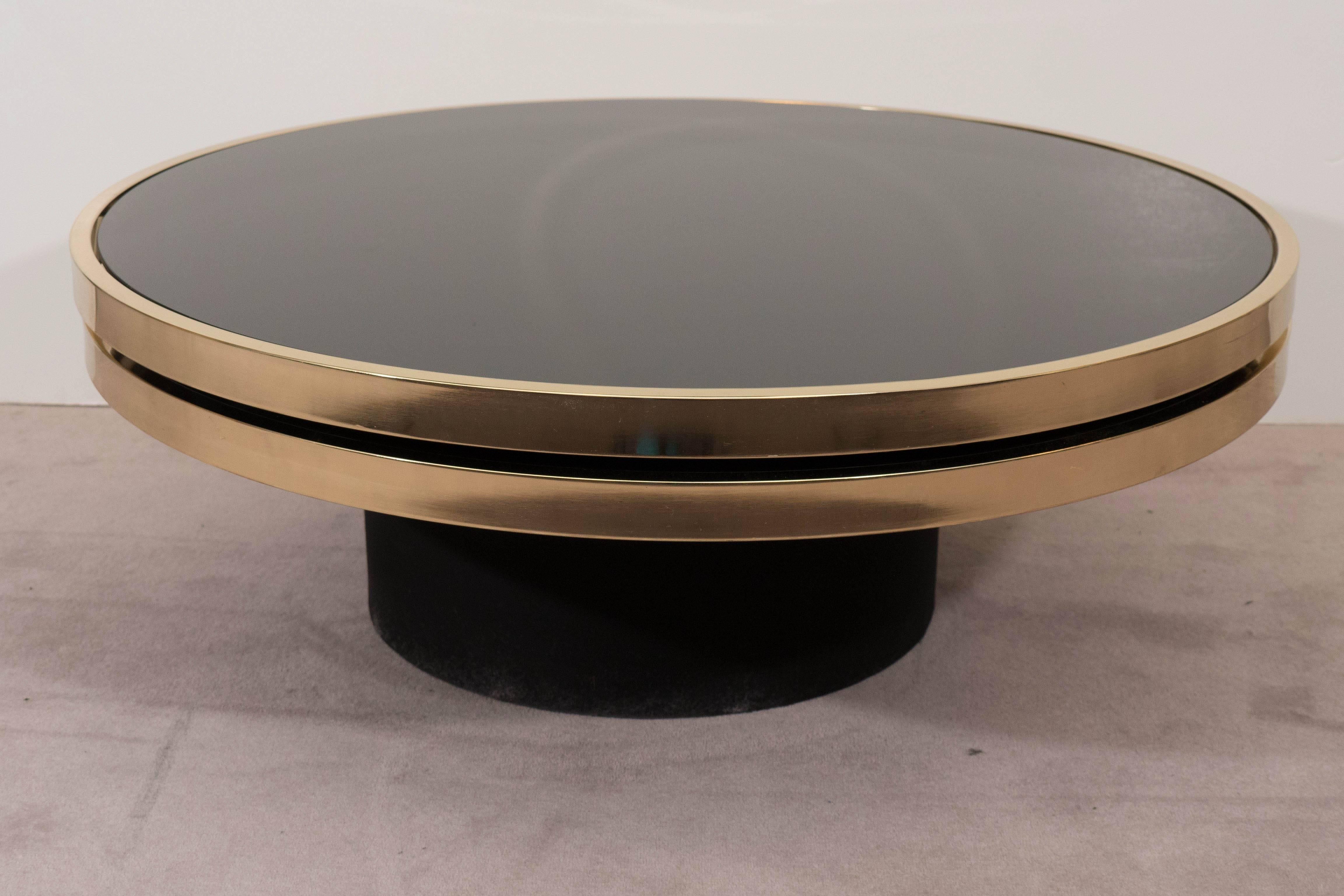 Black Glass and Brass Swivel Cocktail Table by the Design Institute of America 2