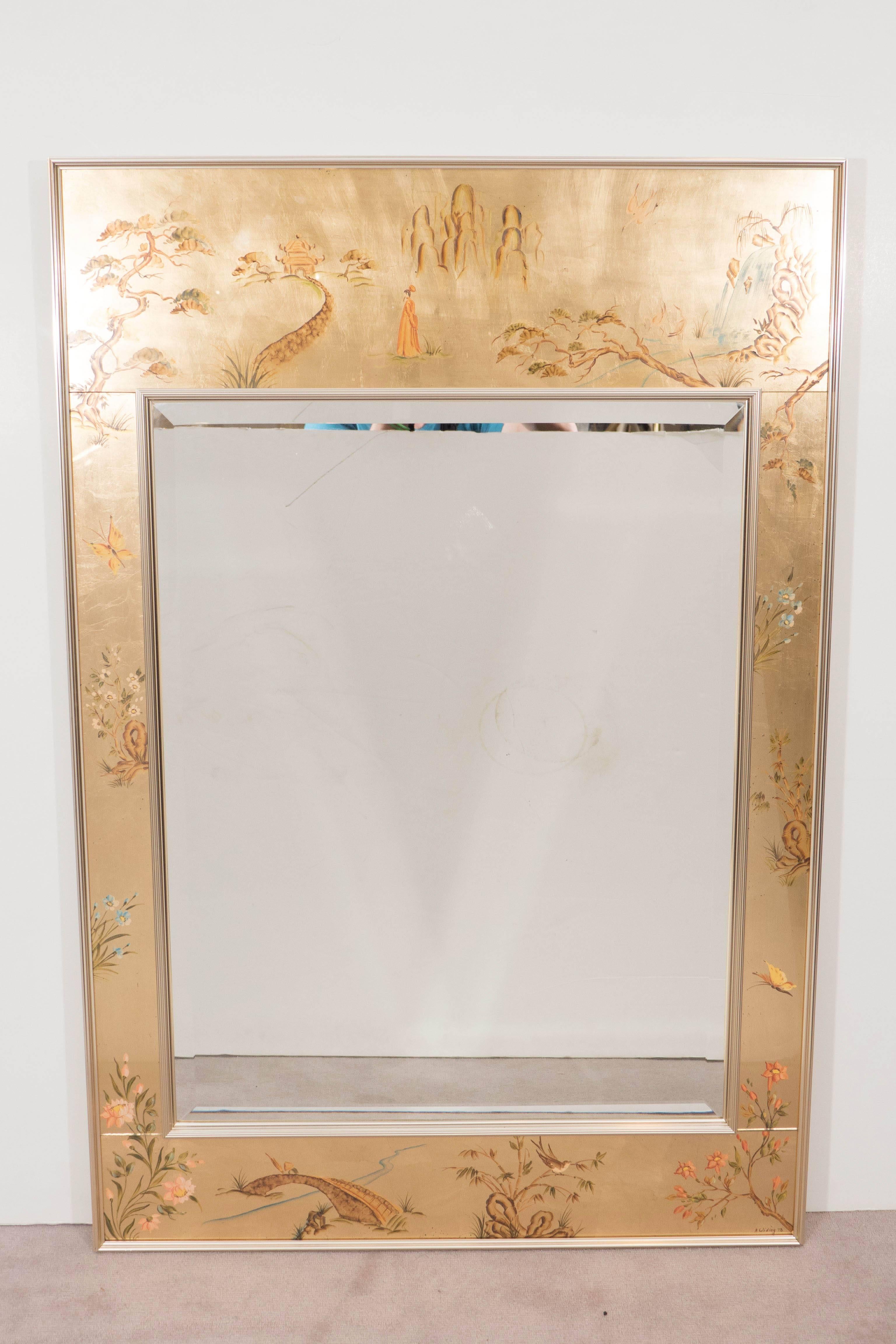 A vintage chinoiserie style wall mirror, produced by Labarge, circa 1970s, inset within a reverse hand-painted églomisé frame, decorated with birds, butterflies and varied floral designs, as well as Asian motifs and architectural elements,