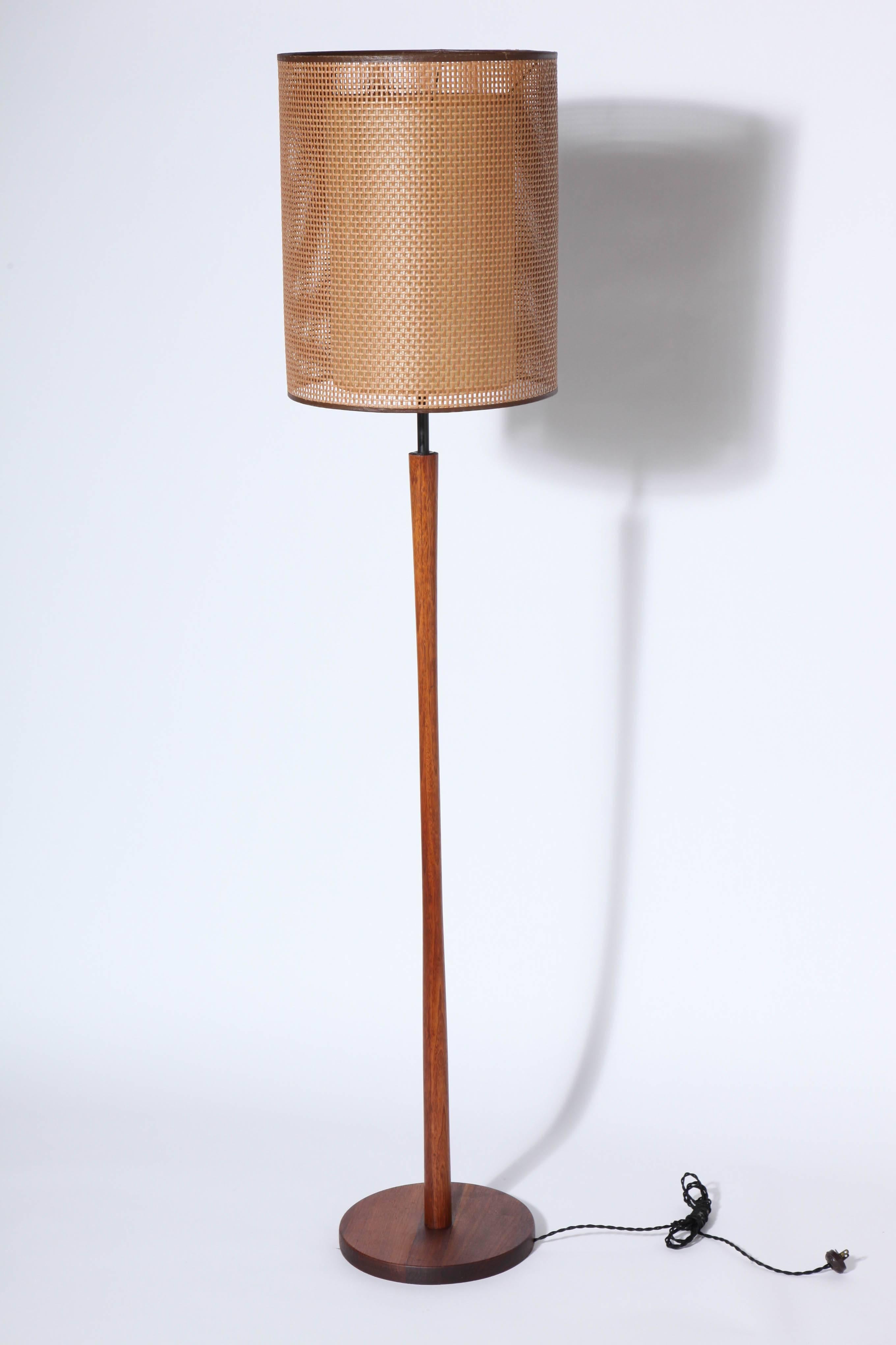 Gordon & Jane Martz for Marshall Studios Teak and Black enameled Brass Reading Floor Lamp, Circa 1960.  Featuring 5 ceramic sockets. Three-way switch. Low and bright light options. Mellow finish. Small footprint. Shade shown for display only. Fine.