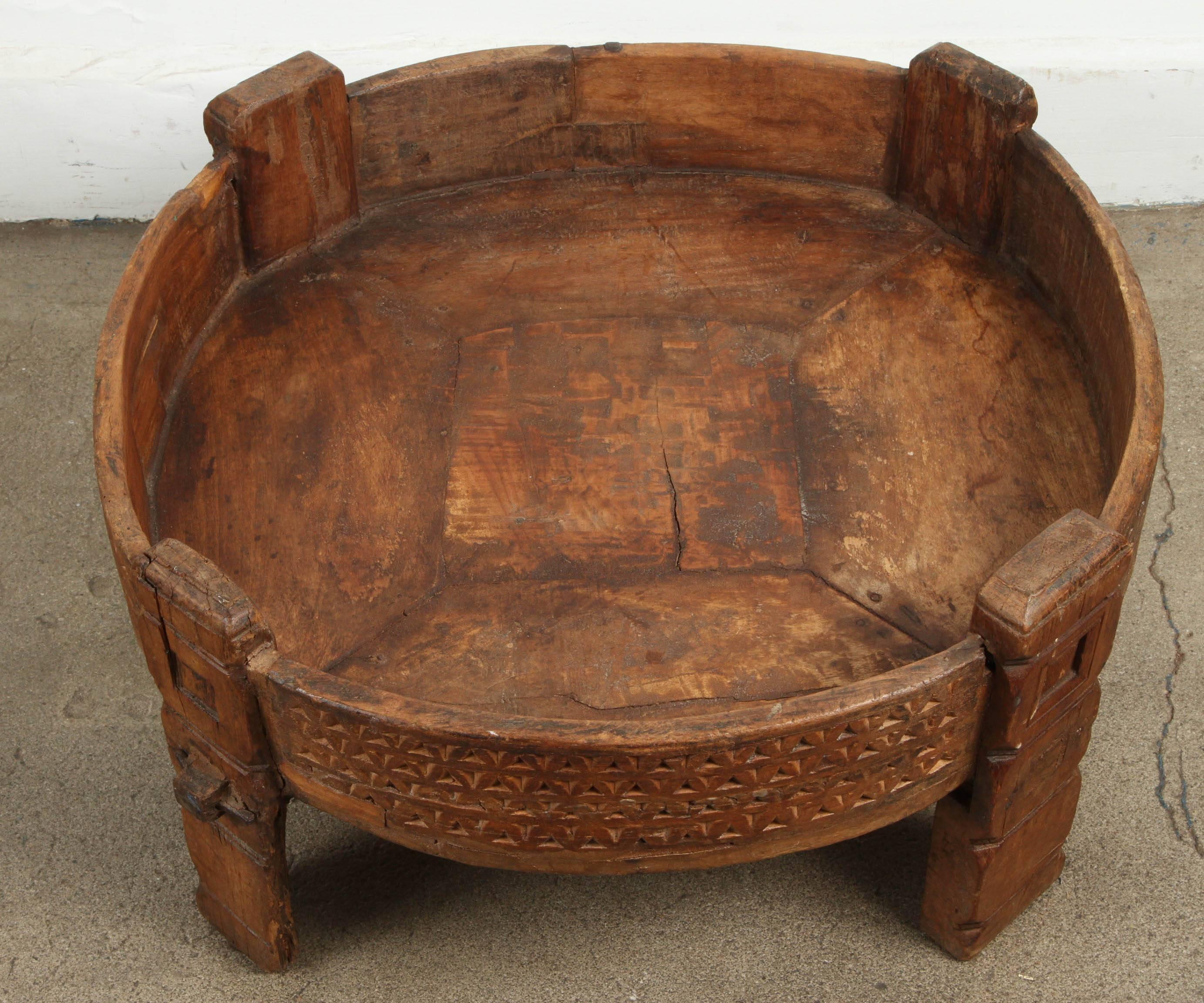 round tribal carved wood coffee table