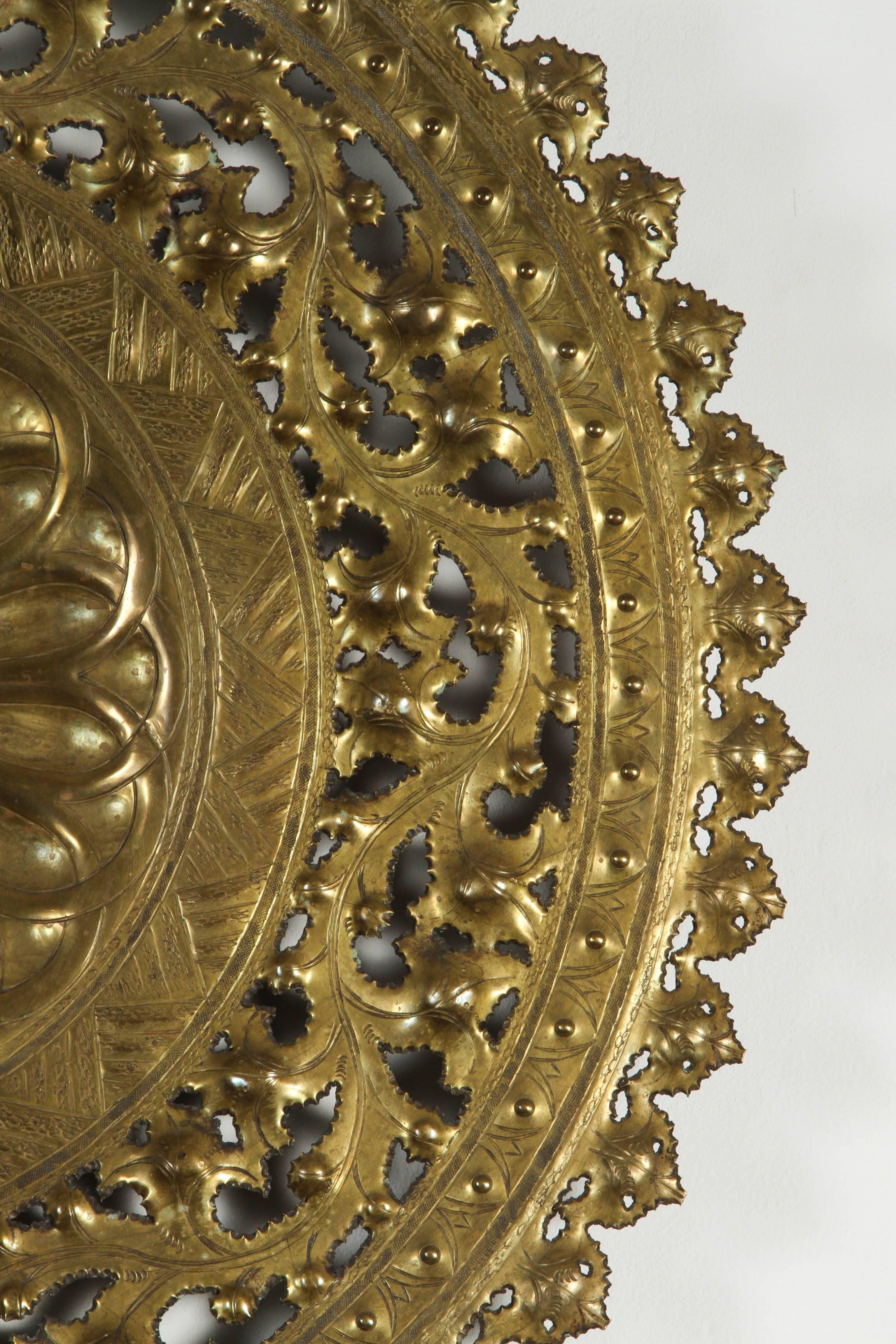Hand-made in Italy, large pierced brass wall hanging wall art tray.
Hammered brass tray marked on underside by Egidio Casagrande.
Truly is a work of art - while this piece is stunning as a decorative piece.
Hand-pierced and embossed with fine