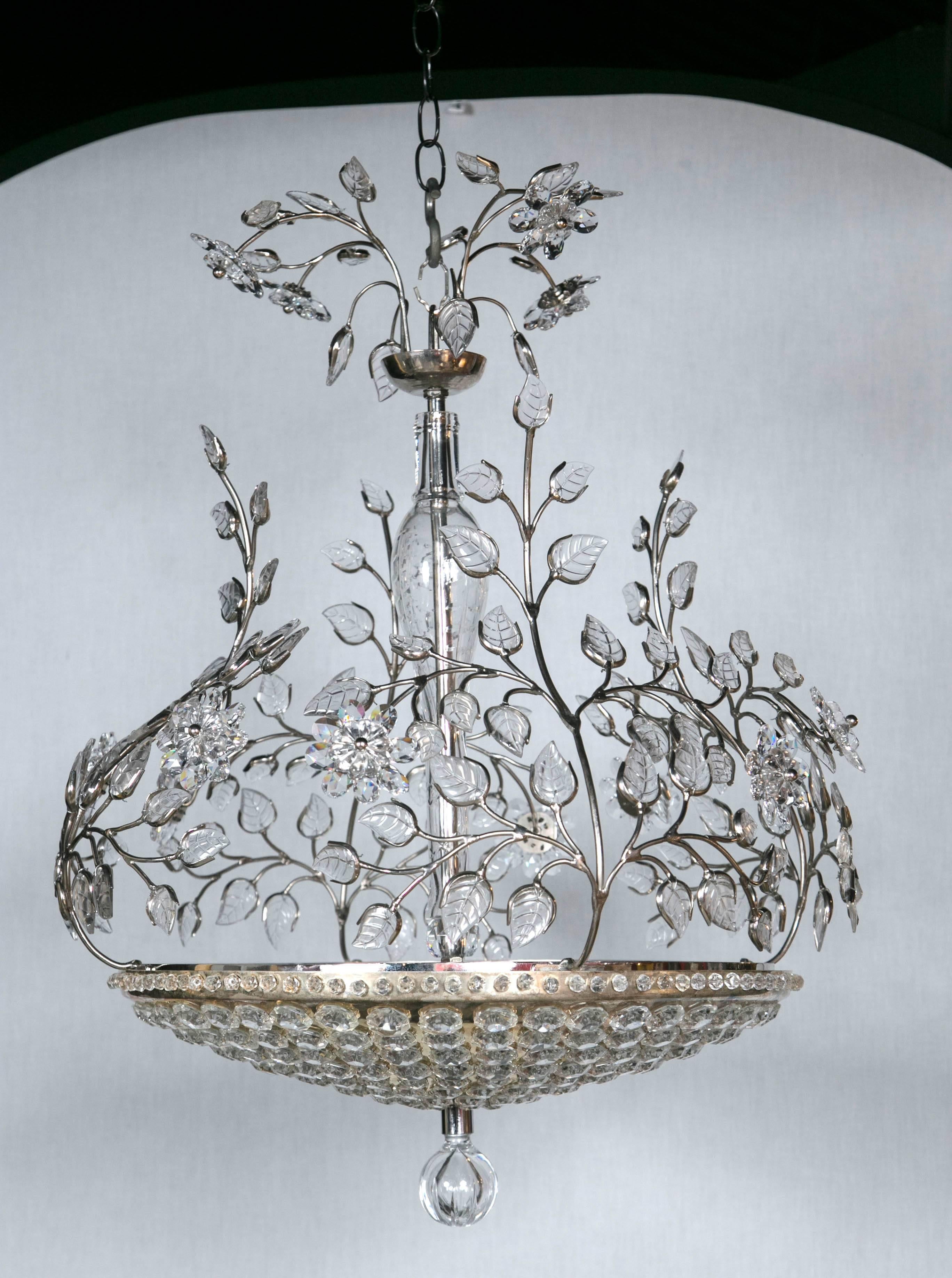 Circa 1930,s French silver plate chandelier with interior lights. Two available priced individually. 