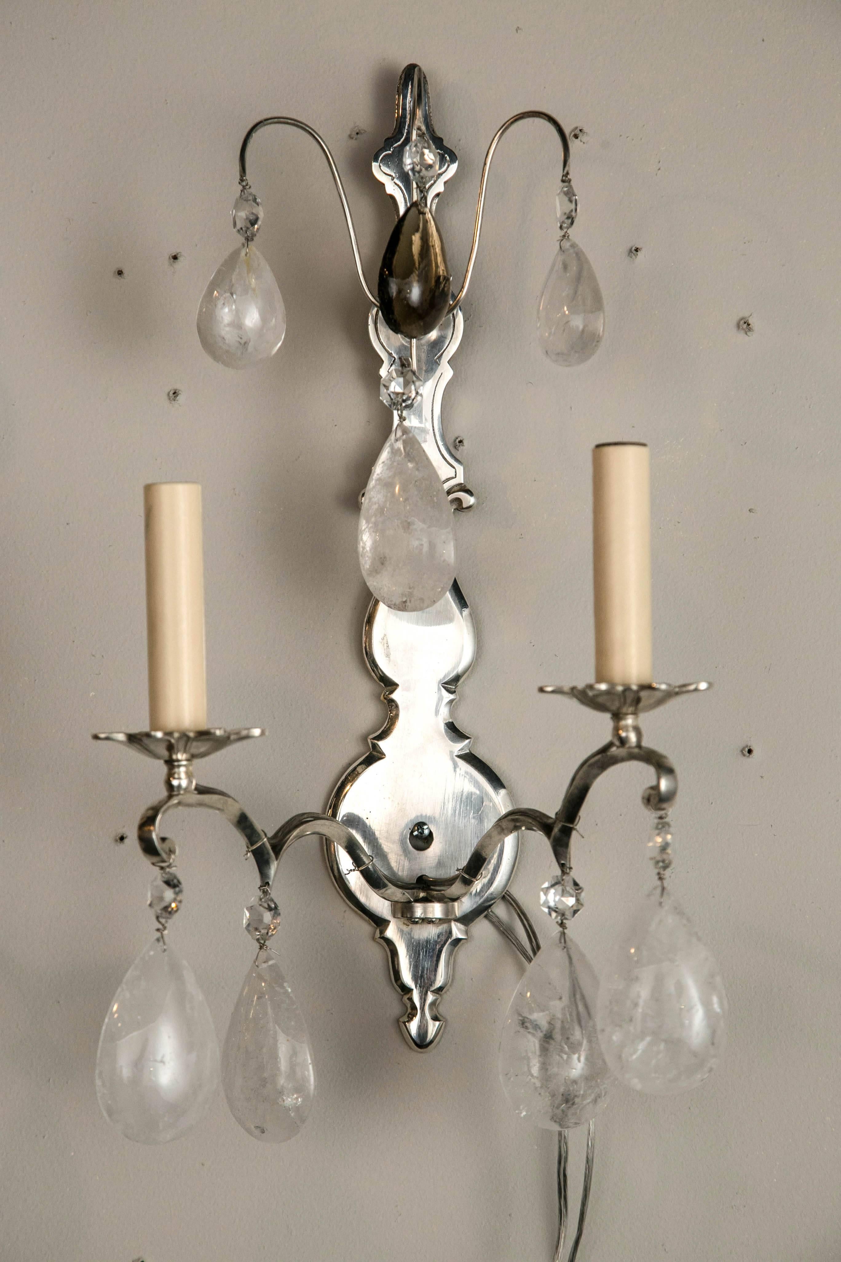 Beautiful Pair of Silver plated on bronze rock crystal sconces Circa 1920's eight pair available priced per pair.