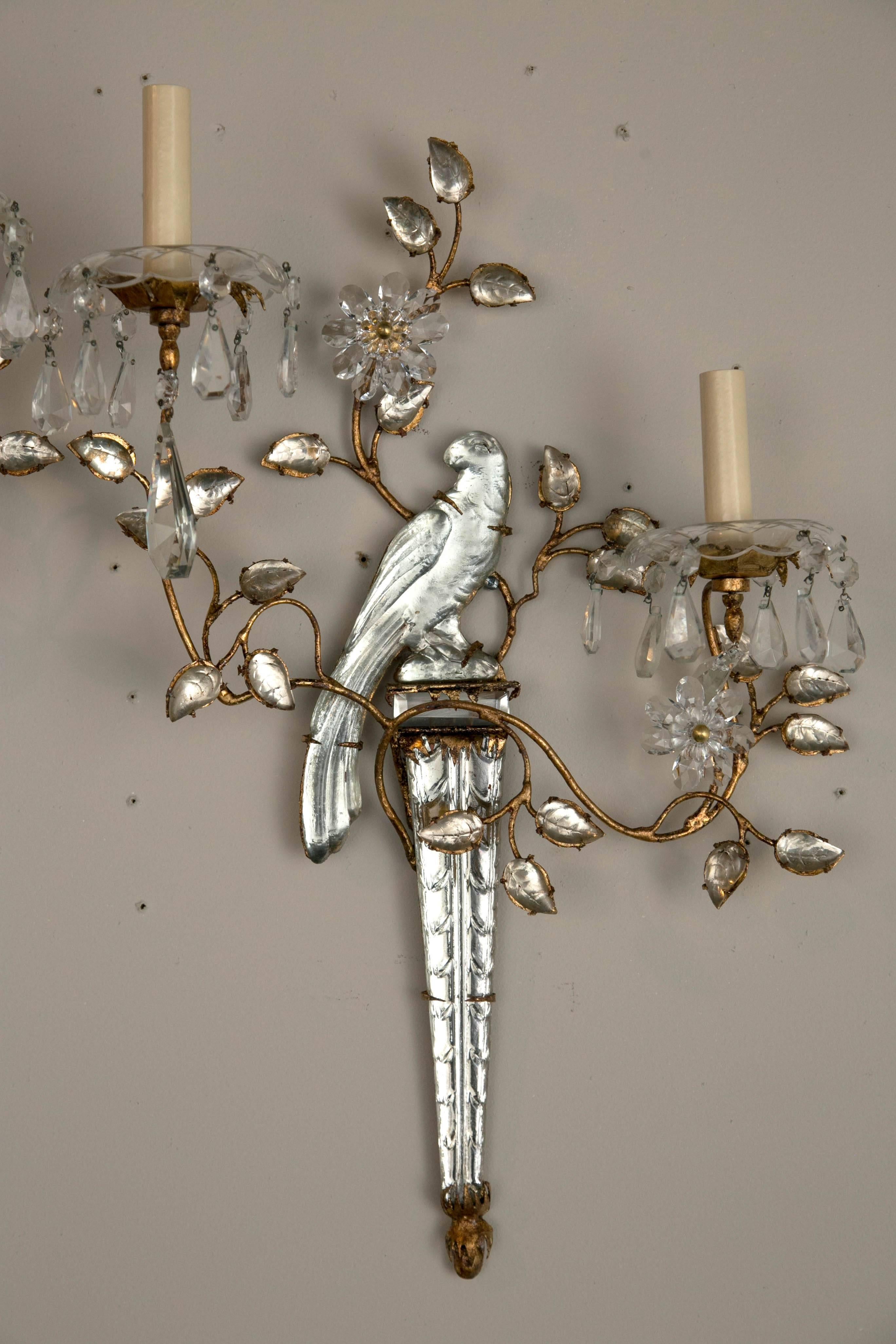 Circa 1940's pair of French two light sconces set of six available pricing is per pair.