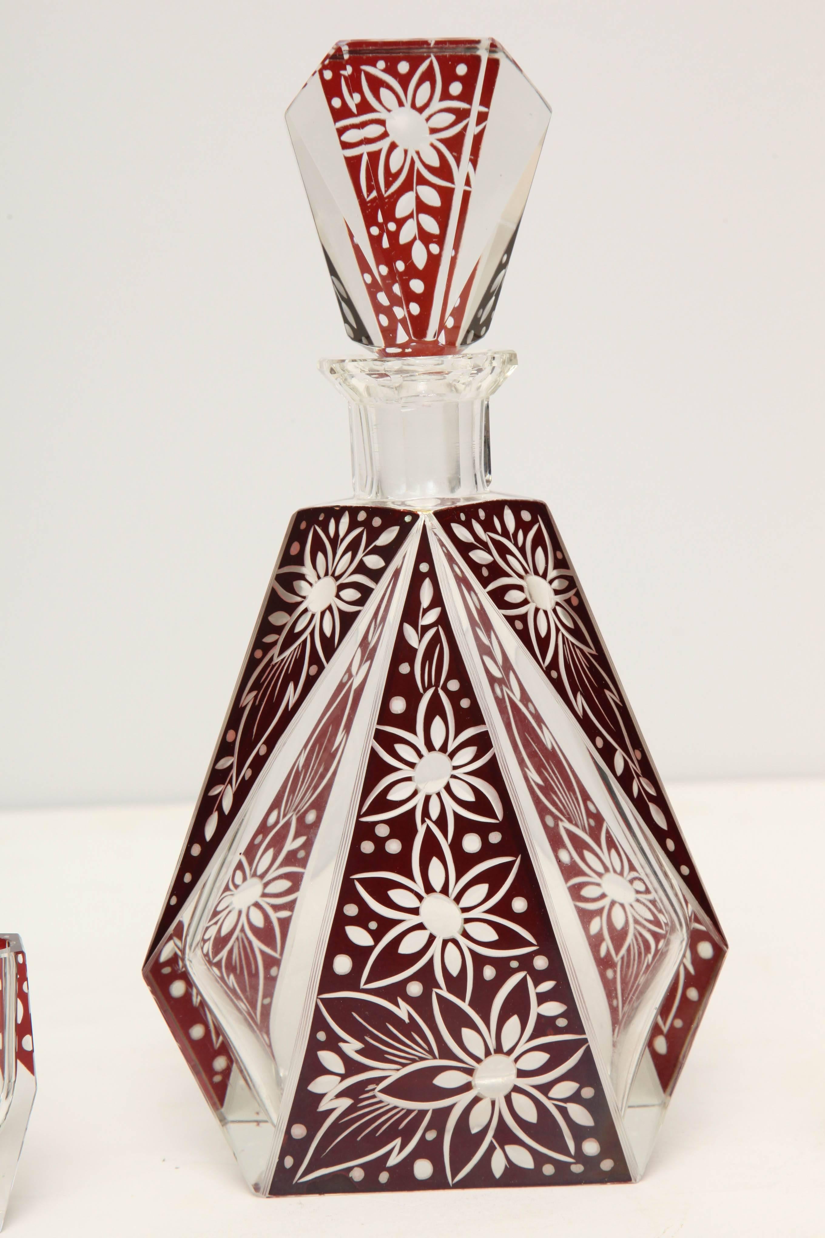 Bohemian clear and cranberry stylized cut-glass.
Decanter is 5.5