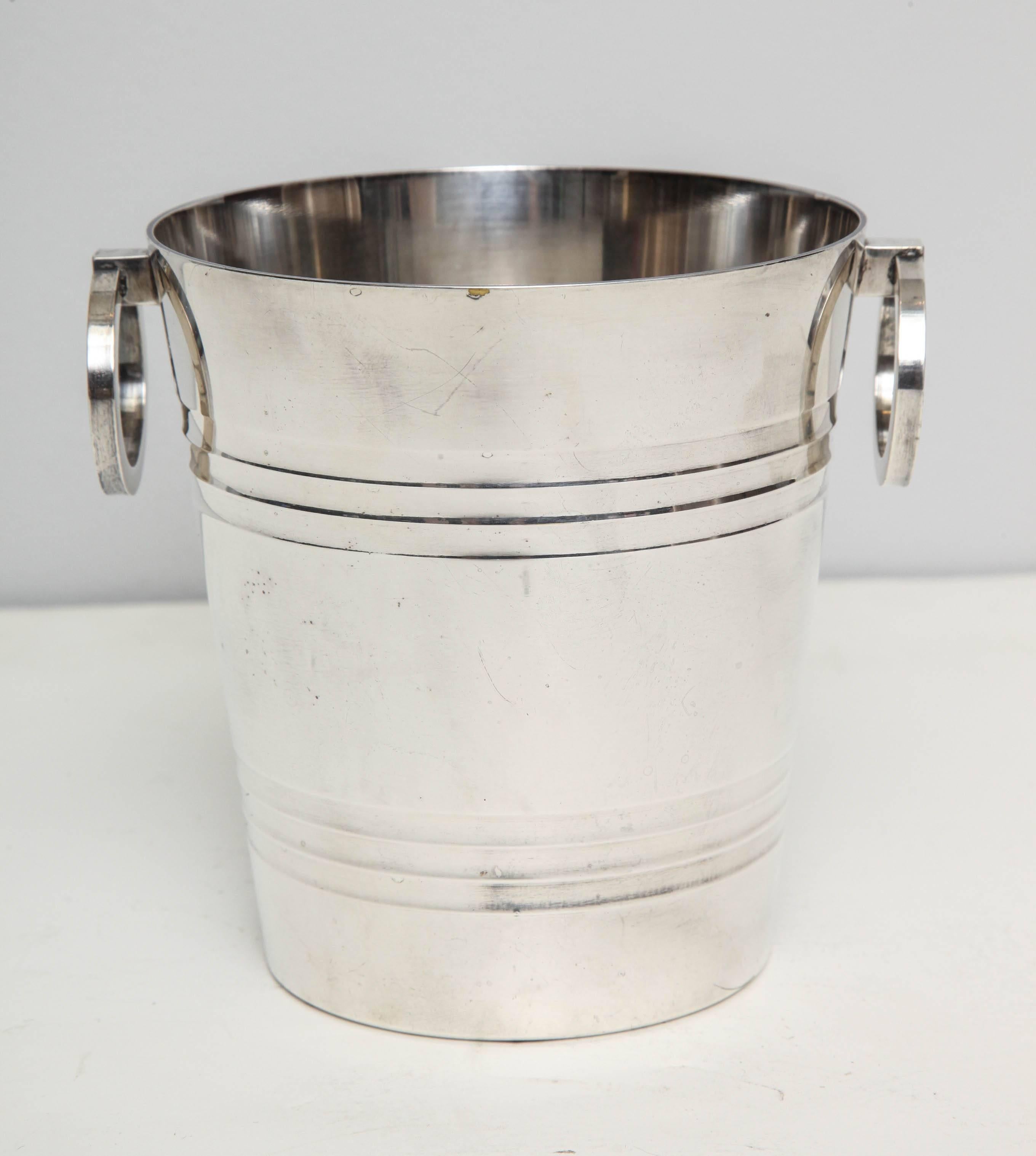 
A small tabletop Art Deco silver wine cooler. Stamped: St. Medard.