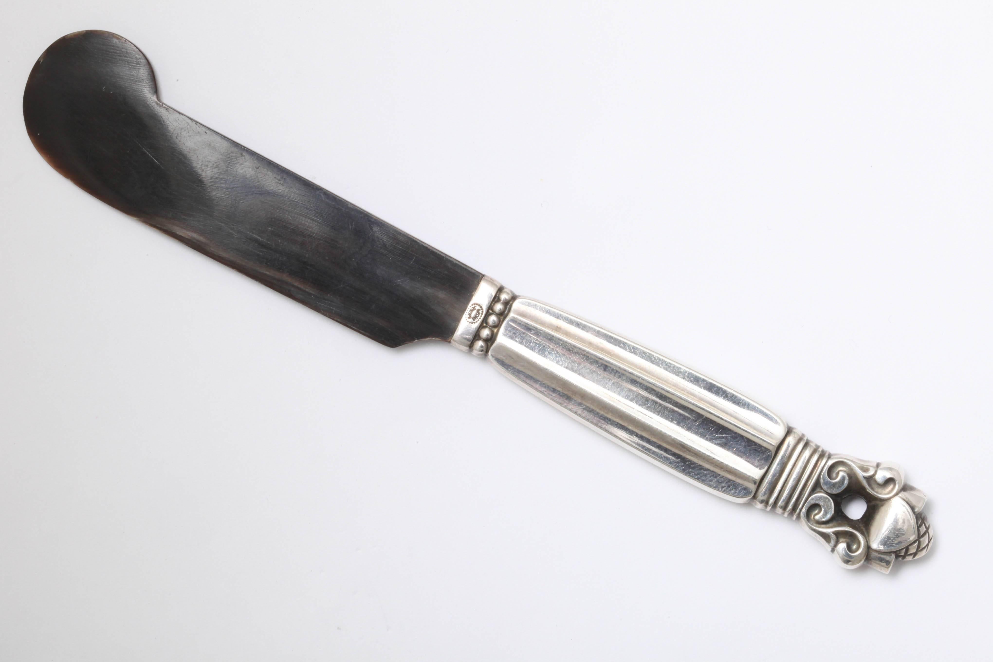 A great Georg Jensen acorn caviar knife with Horn blade and shell dish.