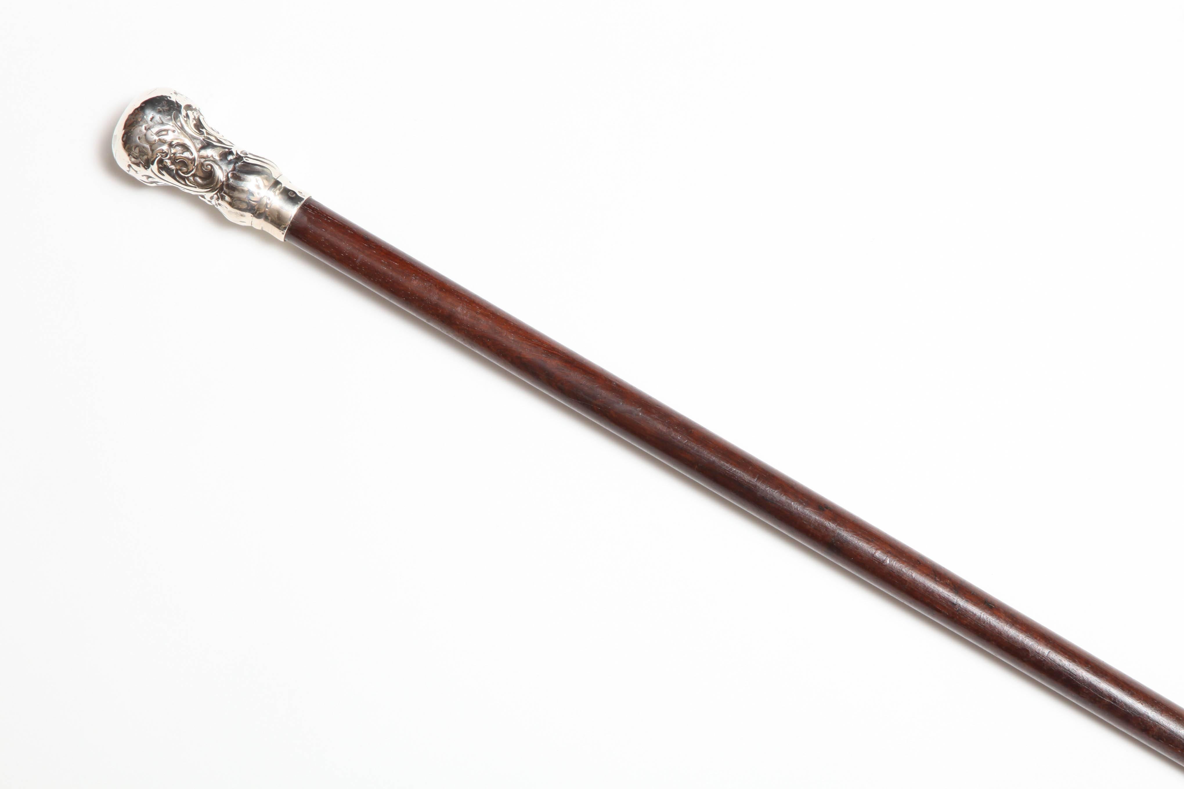 Victorian, French, sterling silver-mounted wooden cane/walking stick, Paris, circa 1890s. Lovely work on sterling silver mount; no monogram. Stands a little over 33