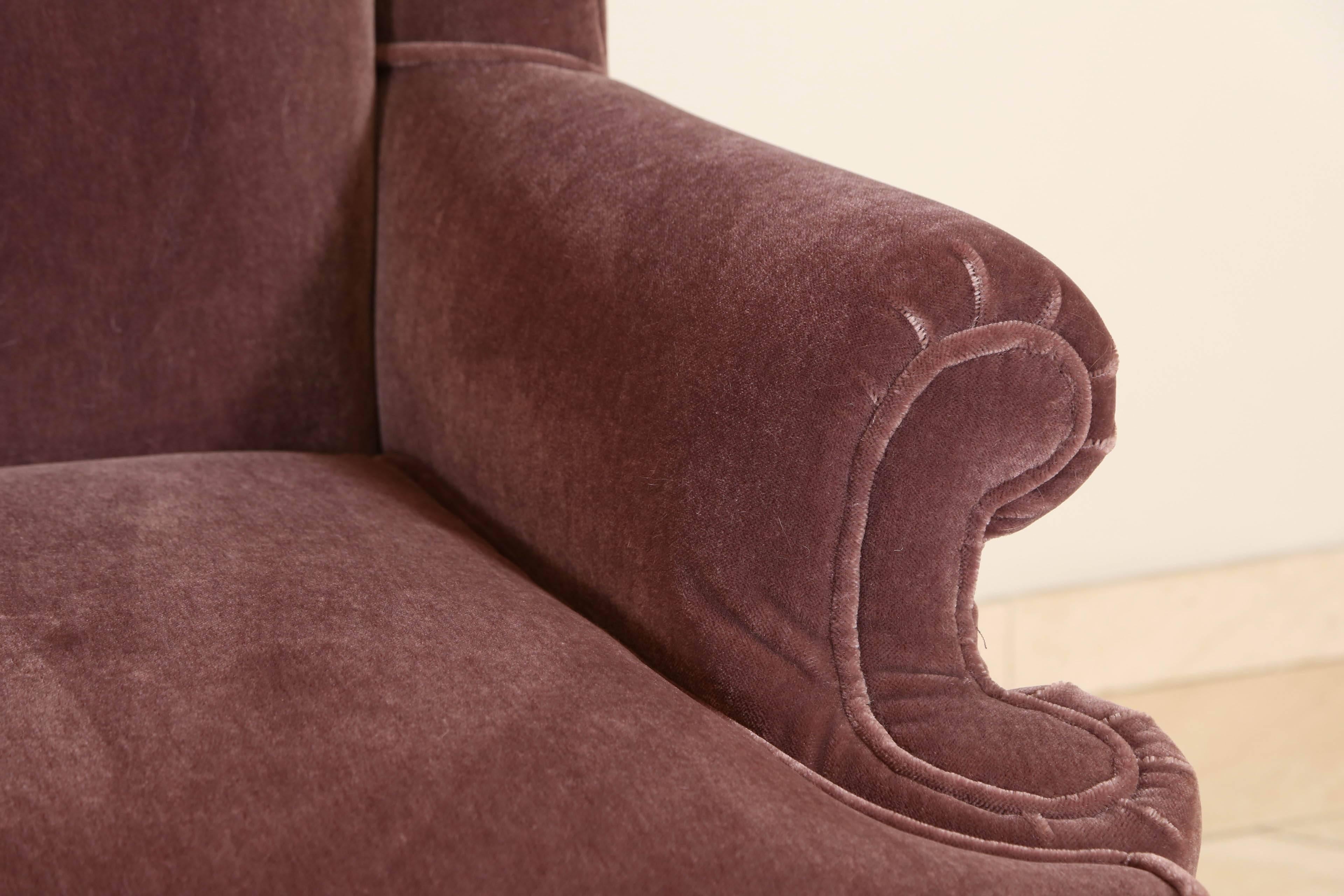 Large sculpted wingback French style mohair club lounge chair.
Newly reupholstered in plum color mohair velvet, excellent condition
A very comfortable armchair.