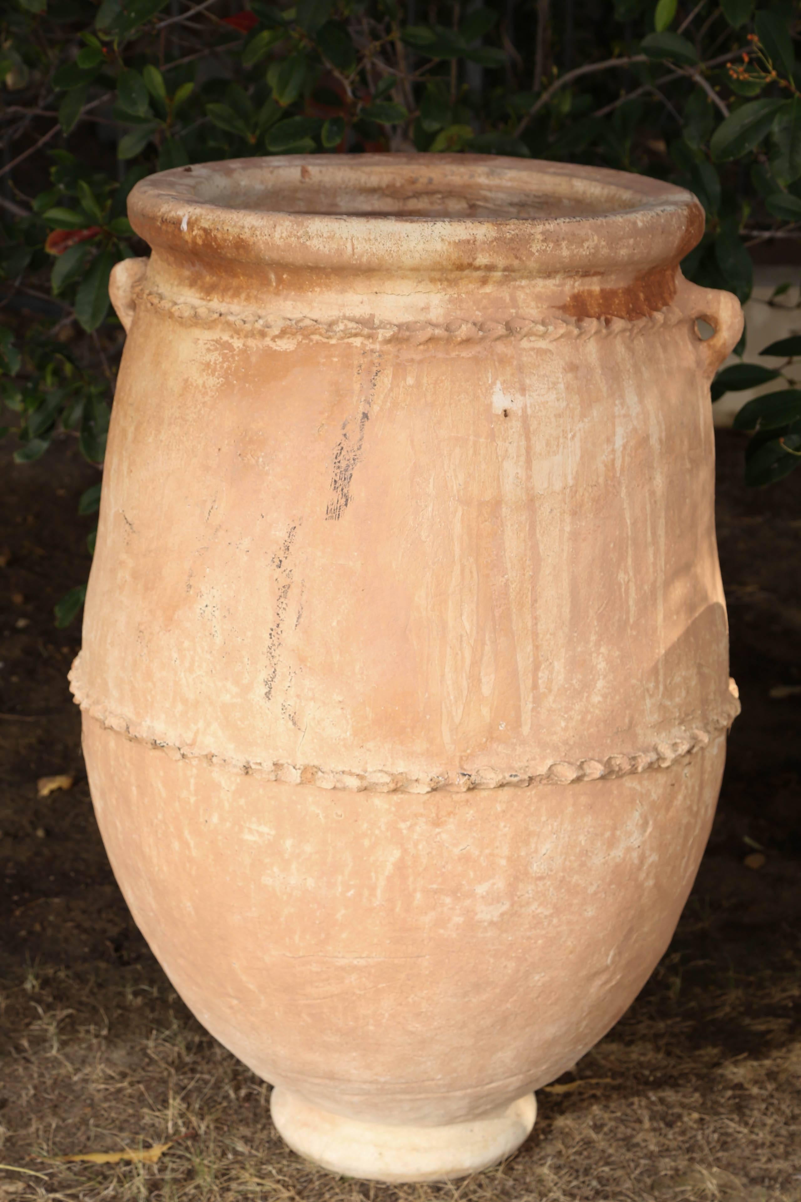 Large Moroccan  terra-cotta garden planters.
Hand-made in Morocco. Large oversized olive oil jar urn cylindrical body garden ornament, could be used indoor or outdoor nice for citrus trees.
Great architectural look, nice addition to any