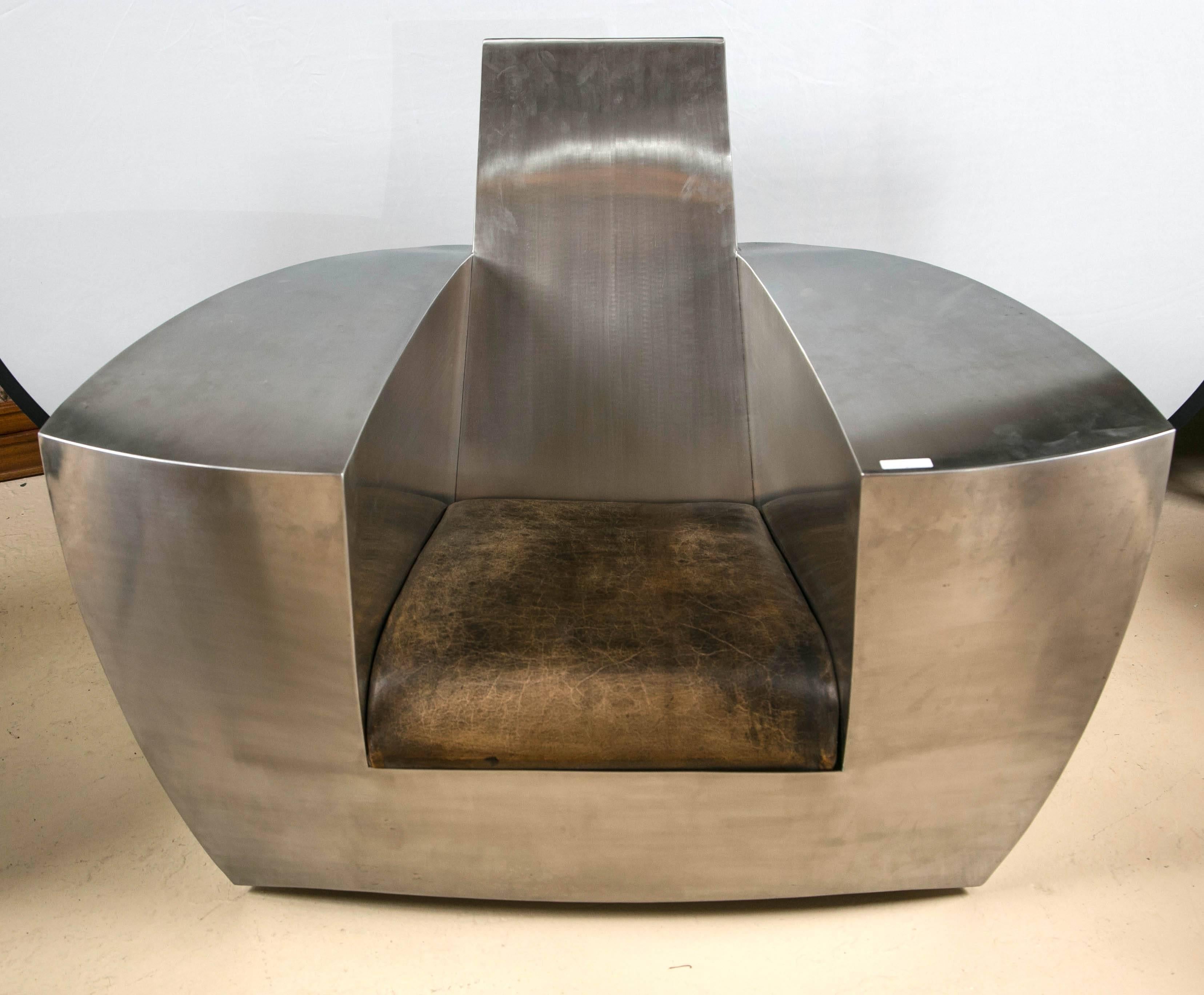 Jonathan Singleton easy number one chair, Spain, 1990s. Stainless steel and leather. Unique style and design. Comfortable and funky.

1/2NM