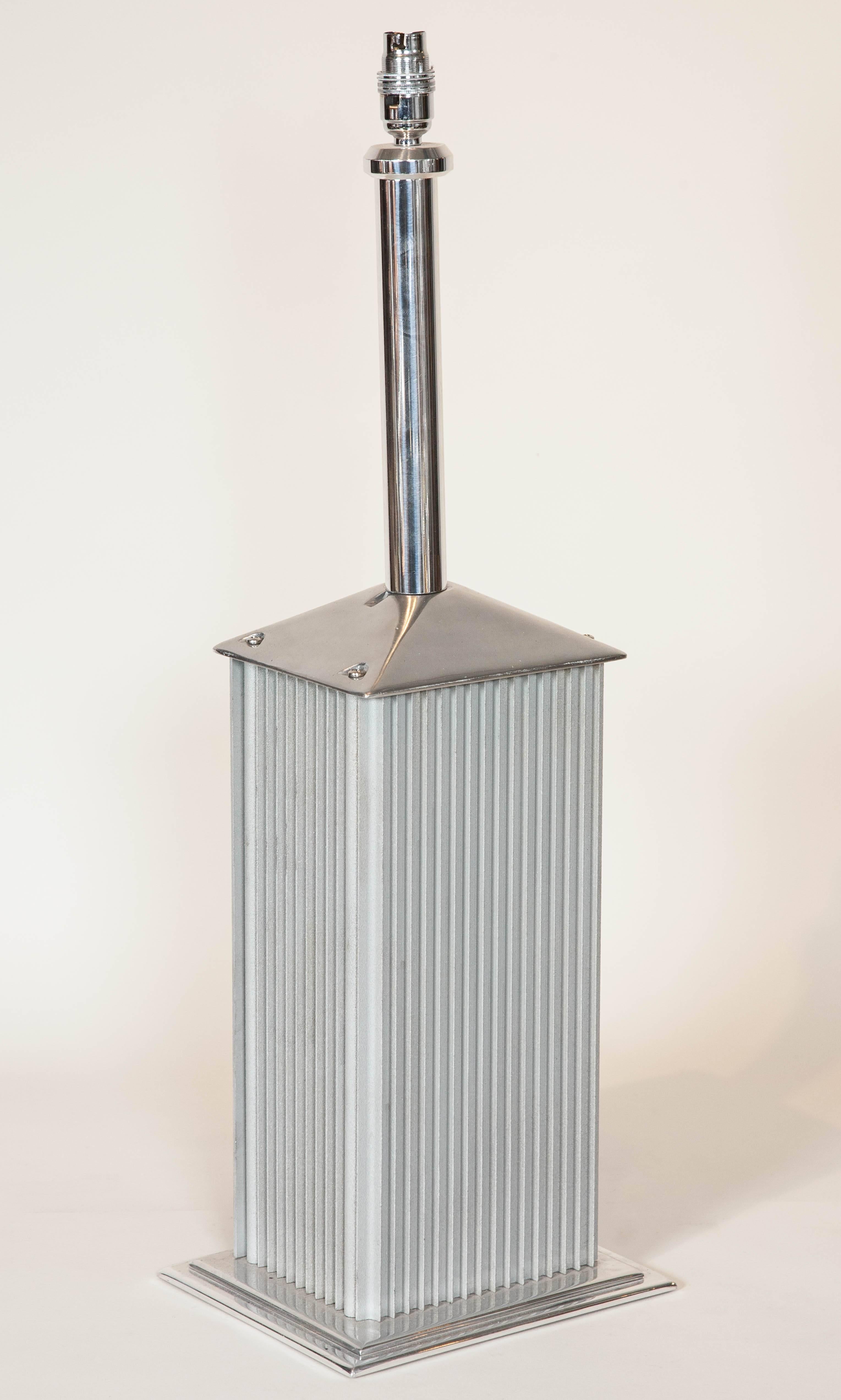 Table lamps constructed from Industrial transformer cases from Holophane lights.

Sold as pairs, but can sell as singles or in larger amounts.

Measures: Height of small size: 25 inches - 64 cm.

Height of large size: 28 1/4 inches - 72 cm.