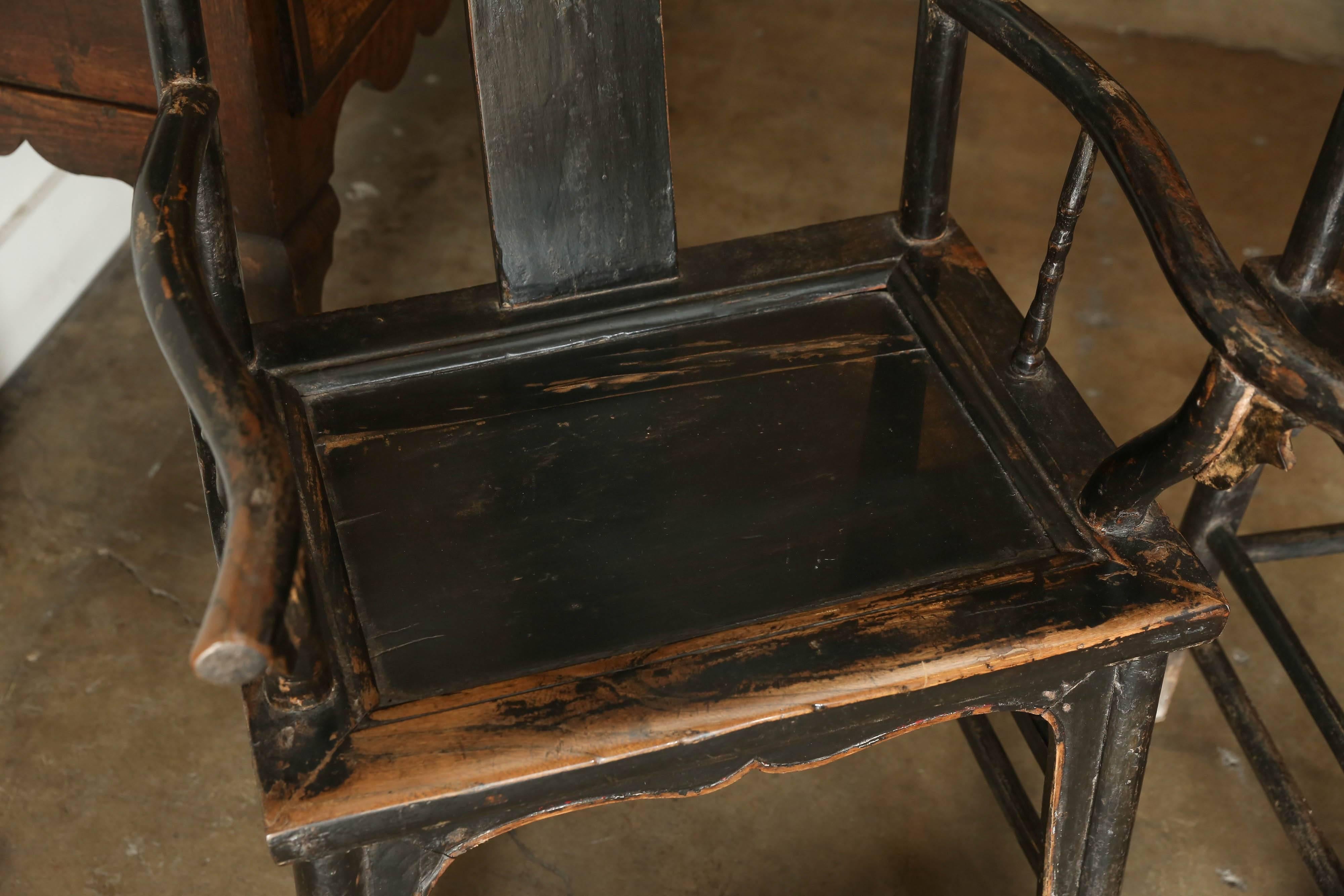 Pair of yoke back elm armchairs, circa 1880-1900, China.