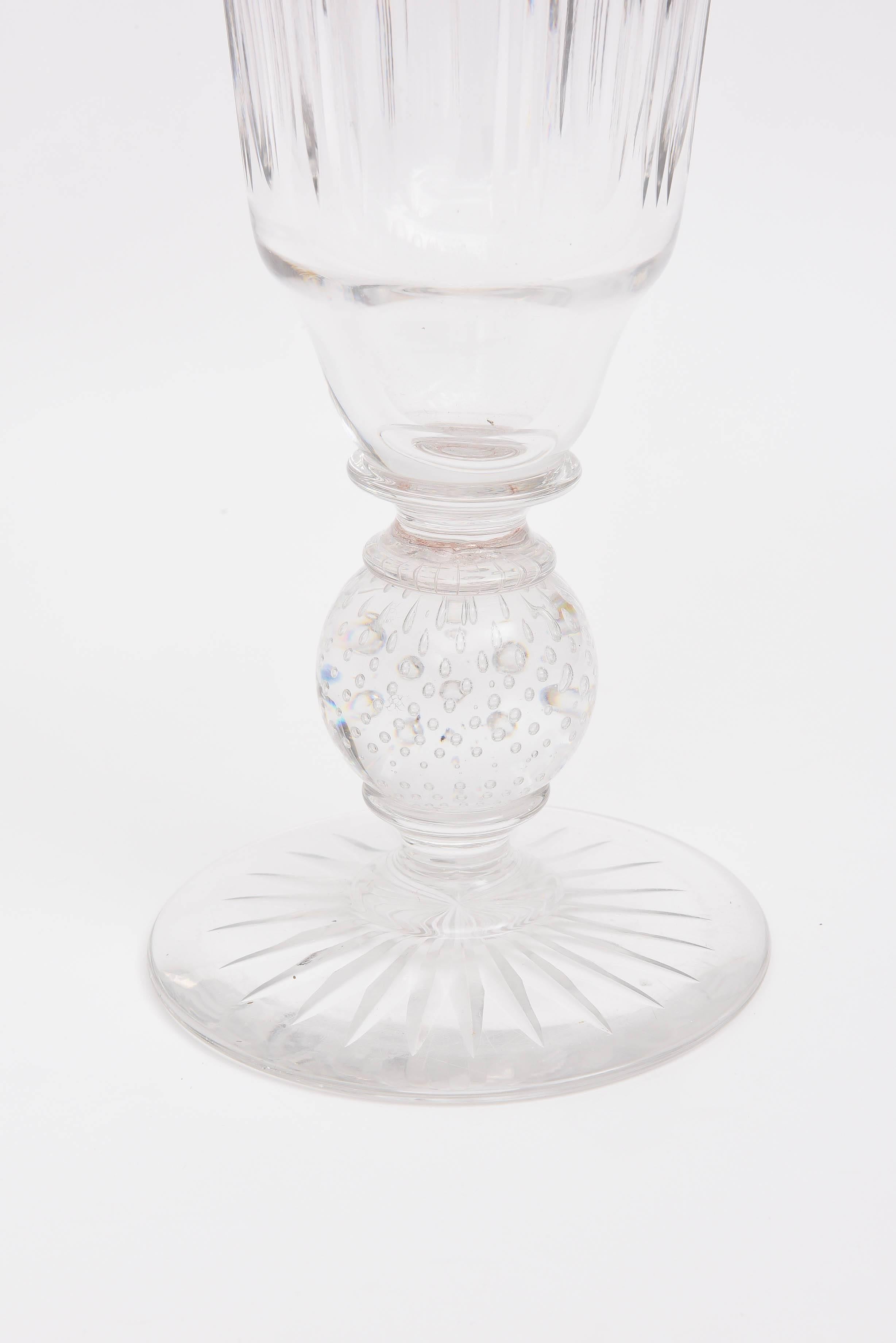 An Impressive and heavy cut glass vase by Pairpoint, MA. Featuring their classic controlled bubble stem with a lovely cross diamond hatch pattern. A nice deep 