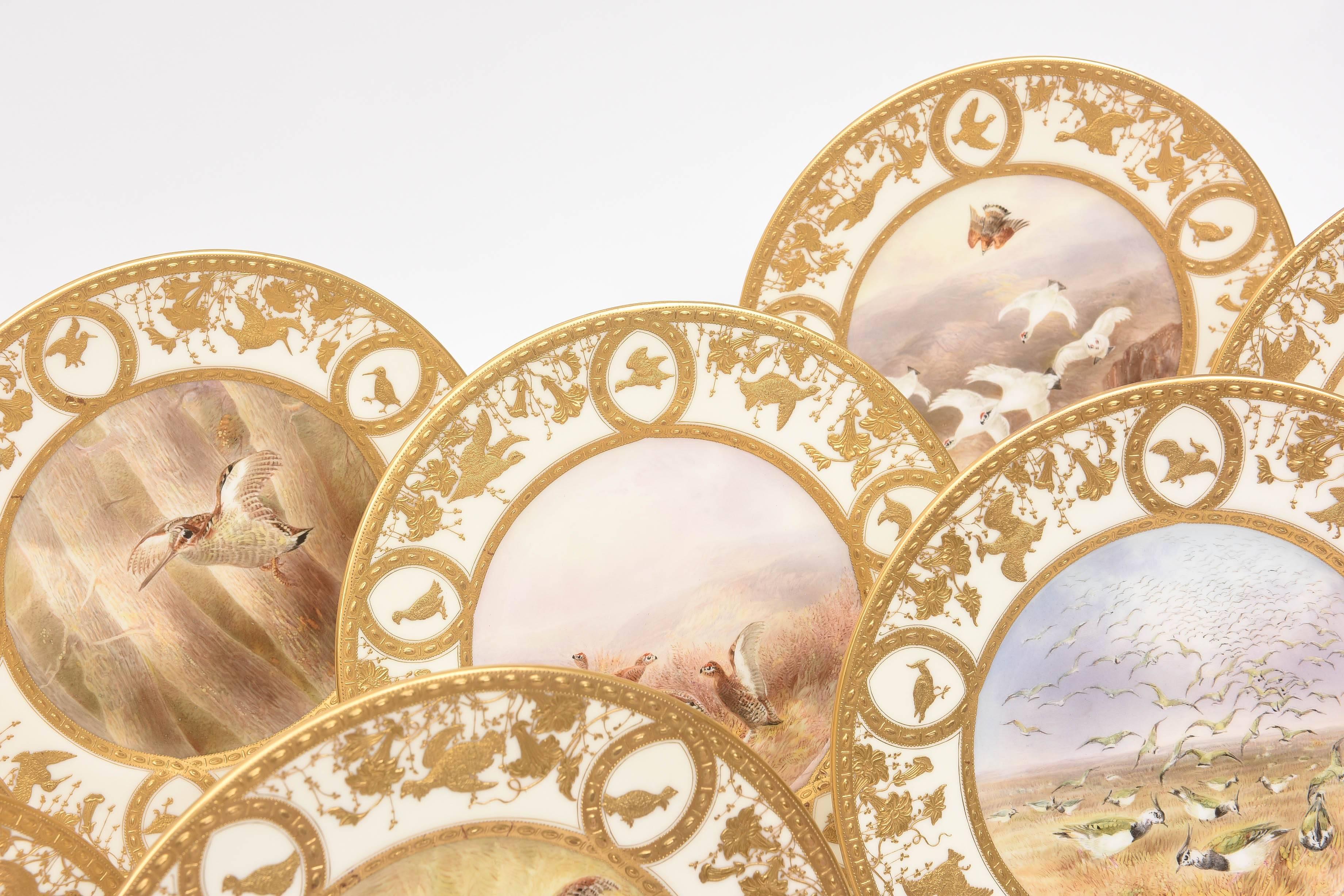 These rare and exquisite signed game bird plates were made for Davis Collamore & Co Ltd. by Royal Doulton, circa 1910. They were hand-painted by Joseph Birbeck ,Sr. who was from a distinguished family of porcelain painters. Birbeck joined Royal
