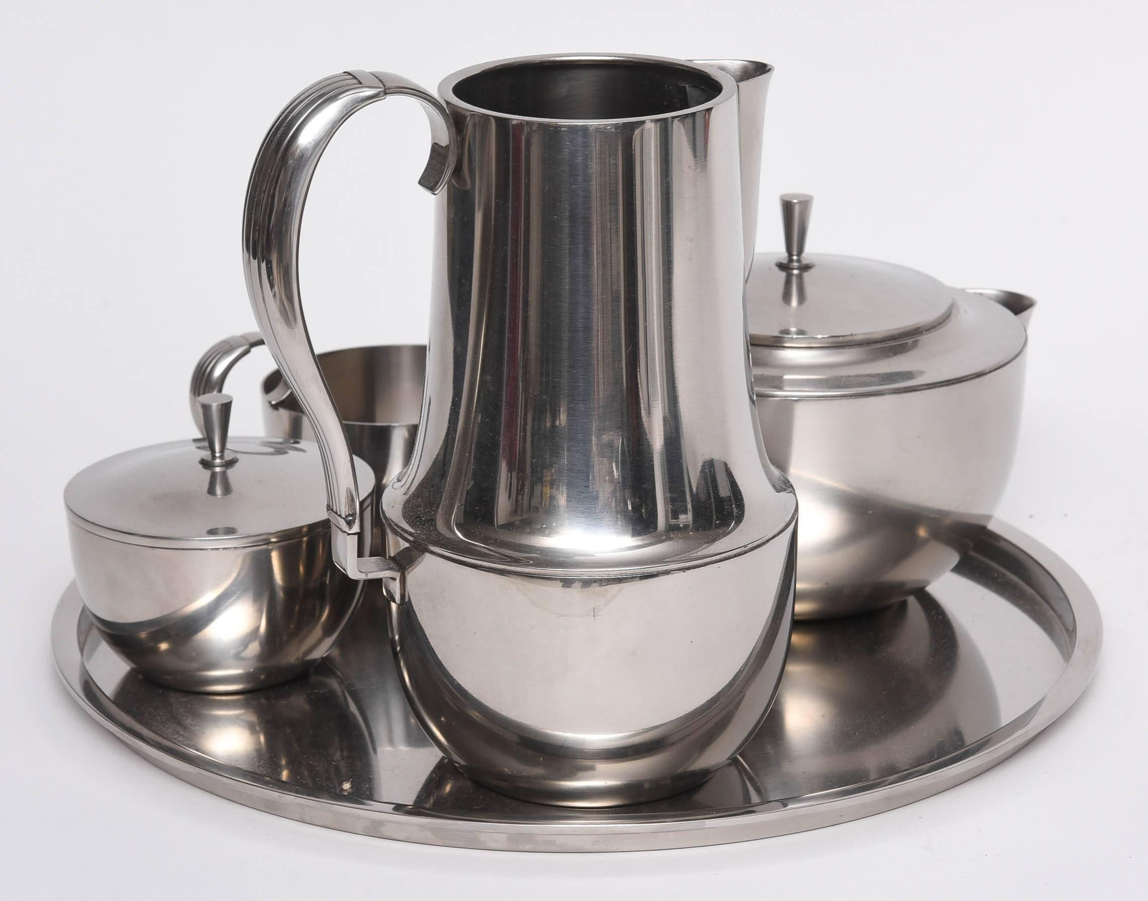 This Georg Jensen coffee set will make the perfect addition to your stylish Mid-Century modern interior. 

Note:  Tray is 11