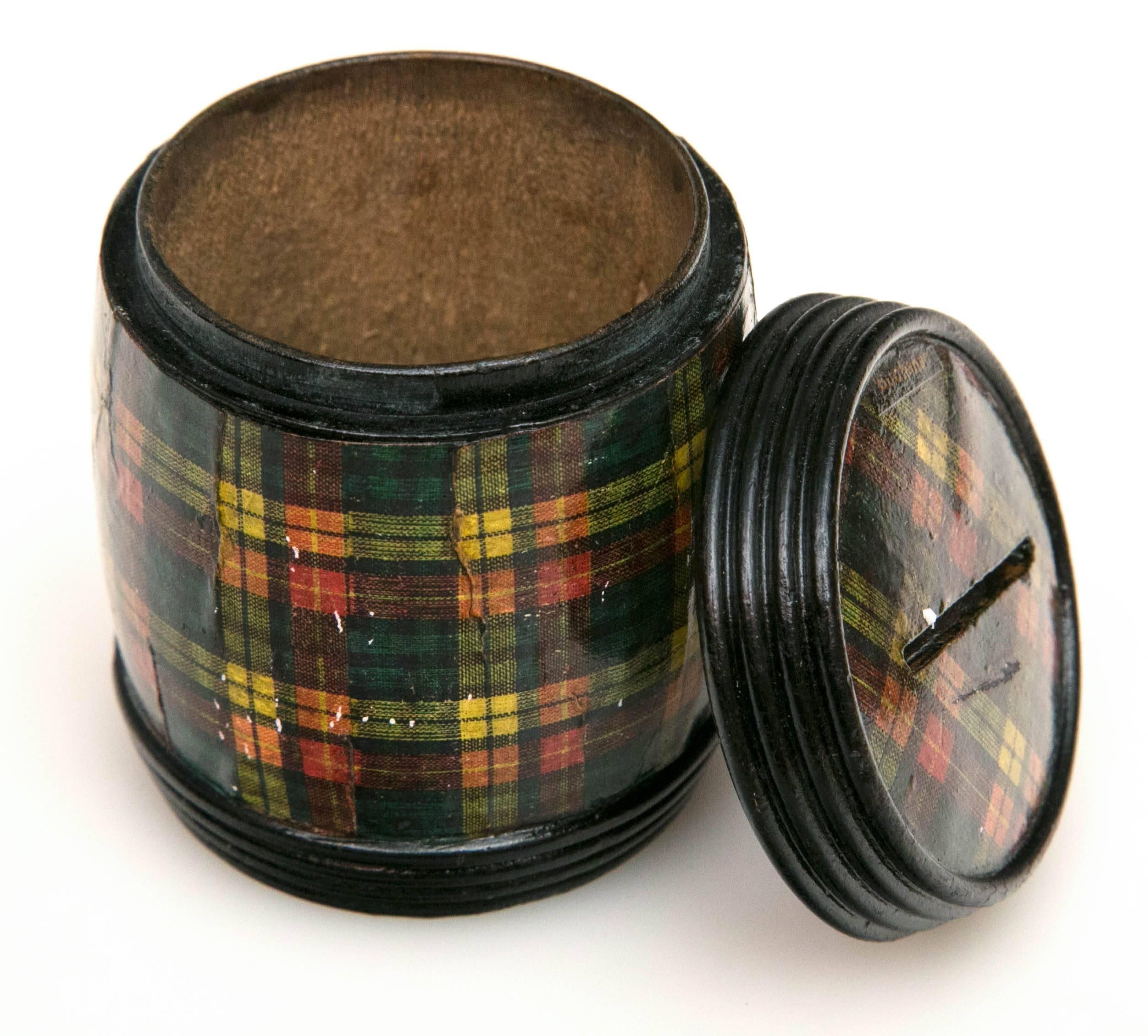 In the mid-1800s tartan became the most popular decoration for souvenirs of Scotland and the box makers of Mauchline soon invented machines to rule the multi-colored clan tartans with many traditional plaid patterns. Soon, new machines were able to