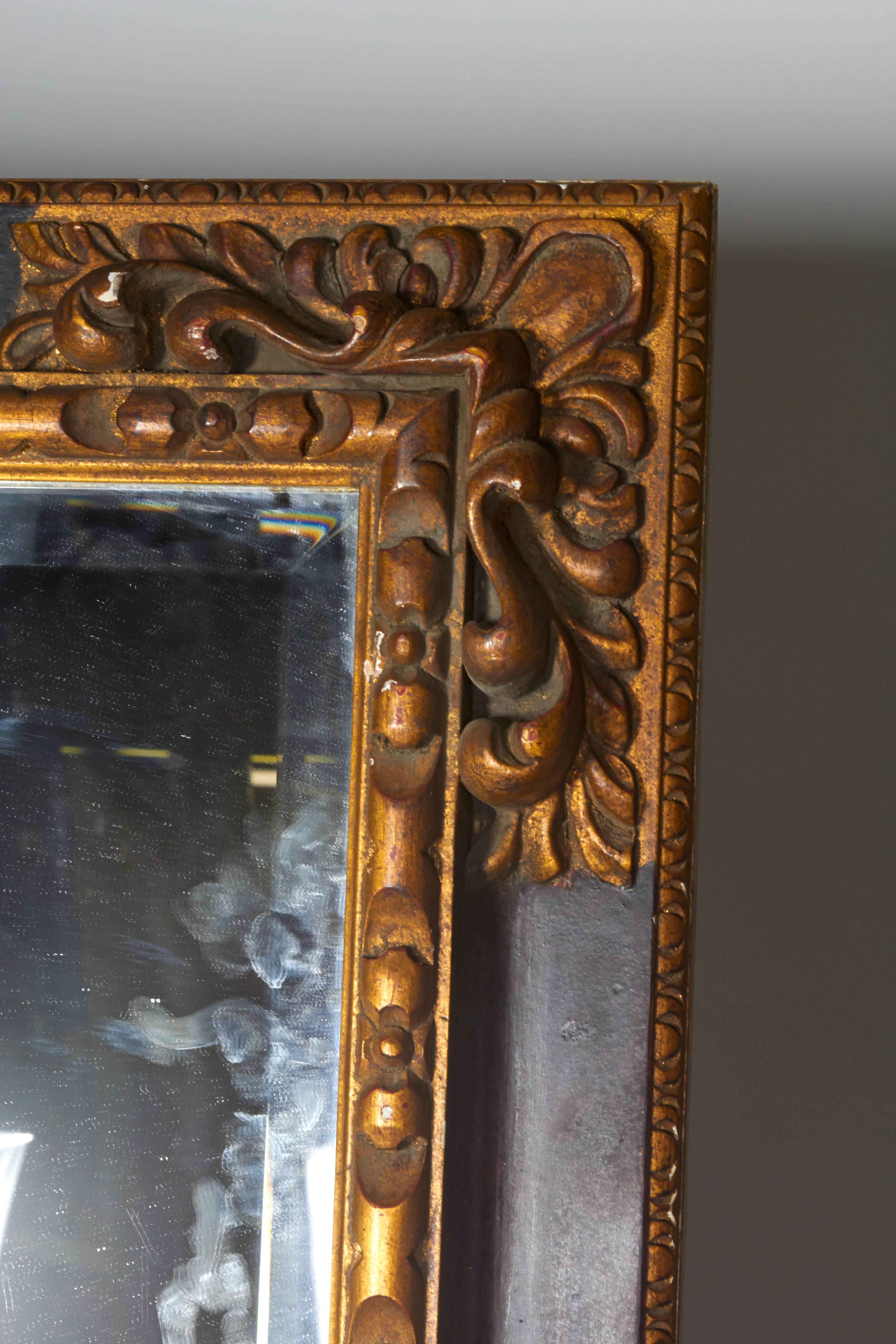 Impressively large ornate frame. Delicate hand-carvings around the mirror. Frame ships in wood crate.

*Not available for sale or to ship in the state of California.