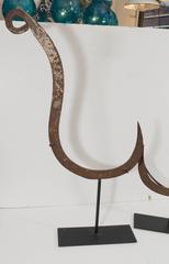 Pair of Mounted Iron Hooks