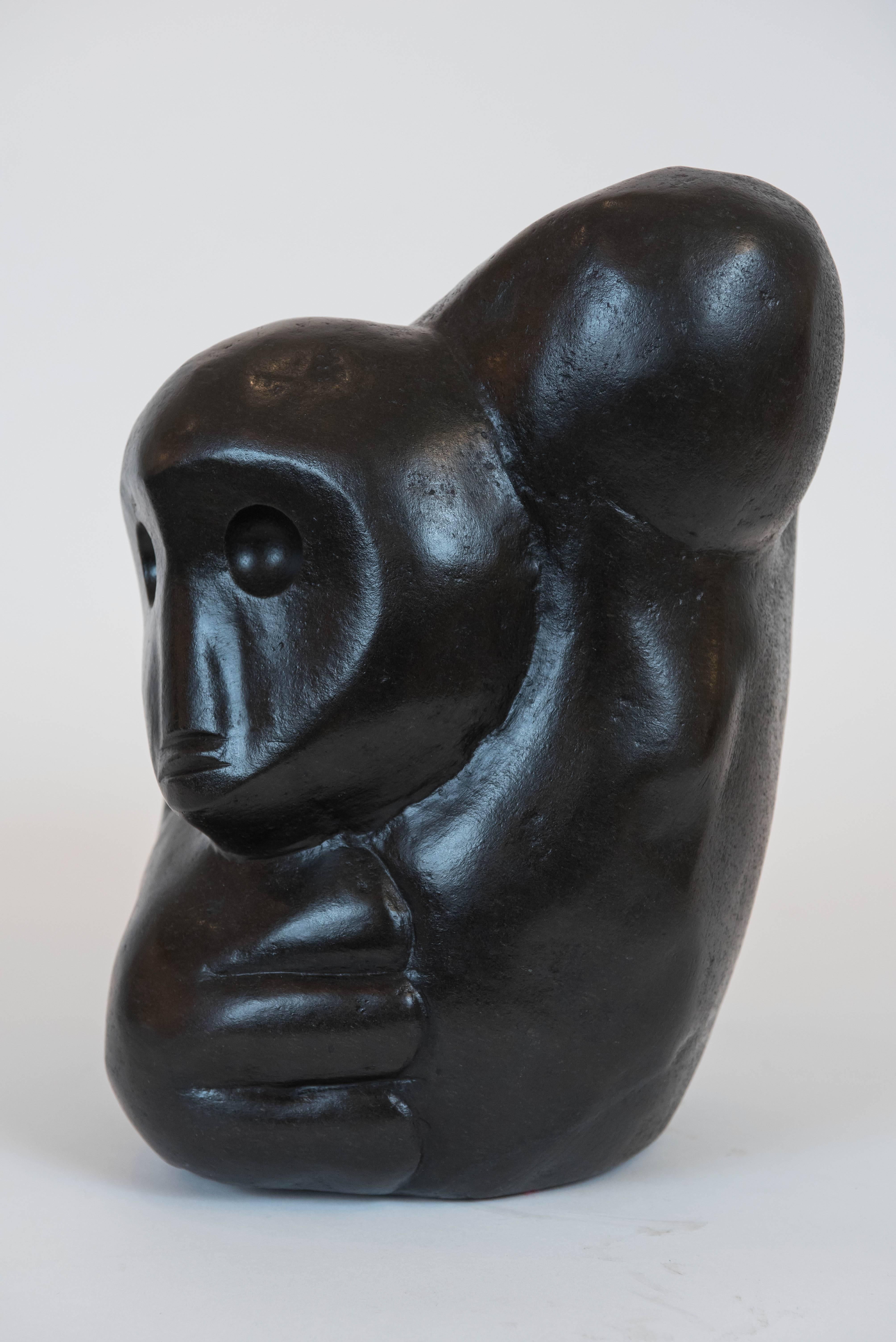 This powerful and poignant sculpture is by master carver Richard Mteki,
whose work has been recognized and collected around the world. It is made of
of black serpentine, a gem-quality magnesium silicate and is signed R. Mteki. It
was originally
