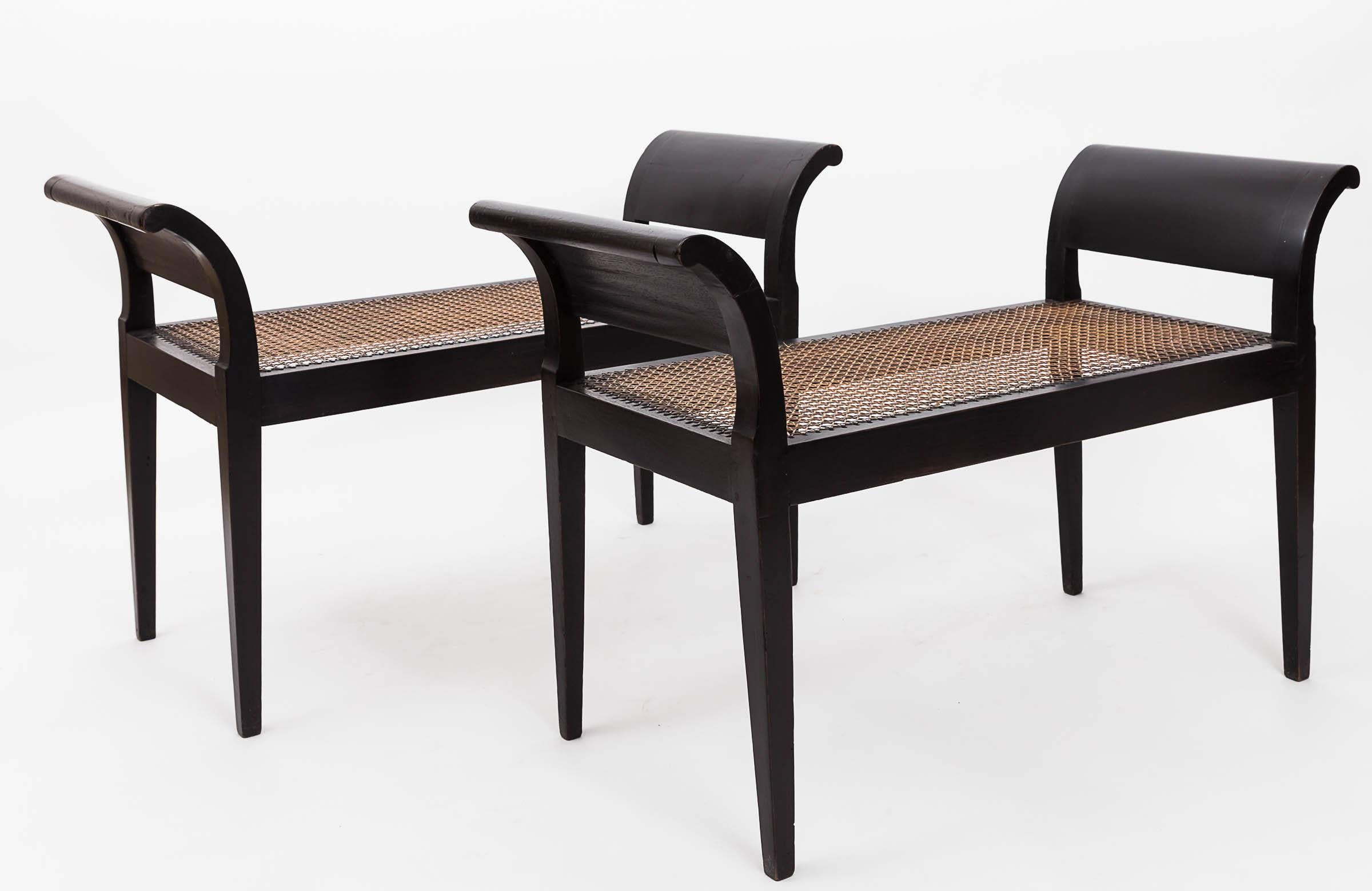 Ebonized mahogany with tapered legs, scrolled arm, caned seats and linen cushion. Can be purchased as a single - $3,000
