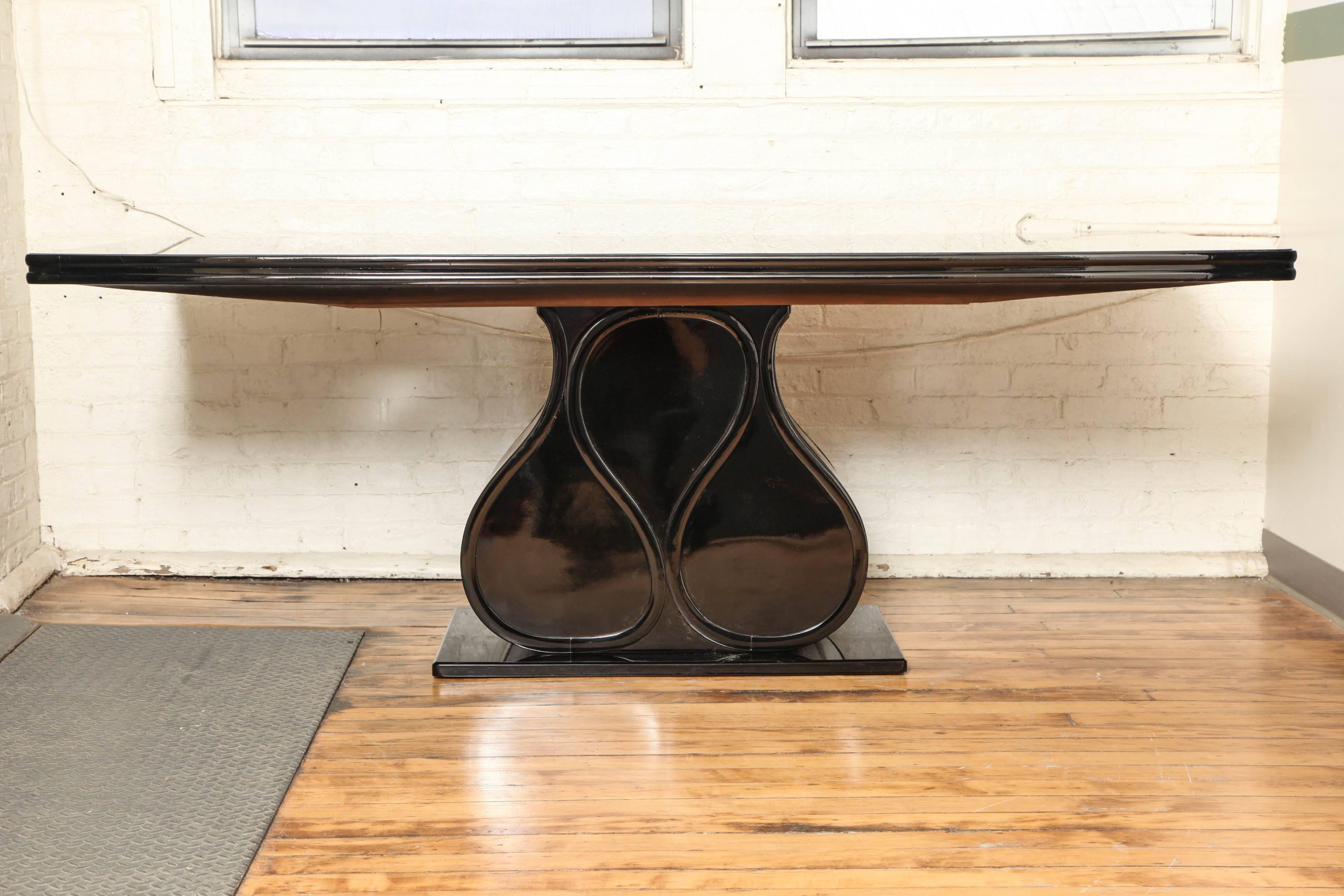 Unique Mid-Century dining table black lacquered base with black opaline glass top.