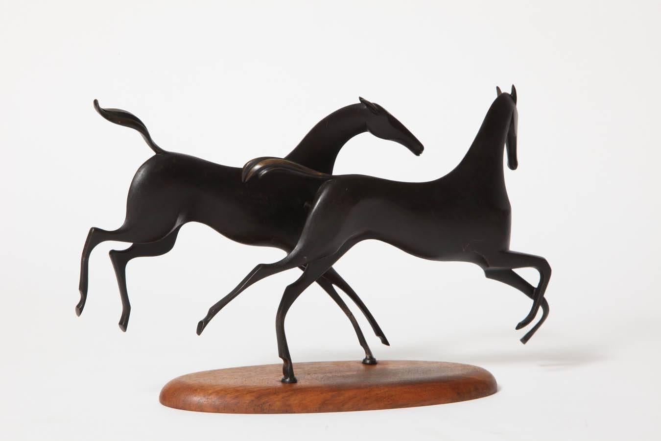 Mid-20th Century Hagenauer Prancing Horses, Bronze and Wood, circa 1950