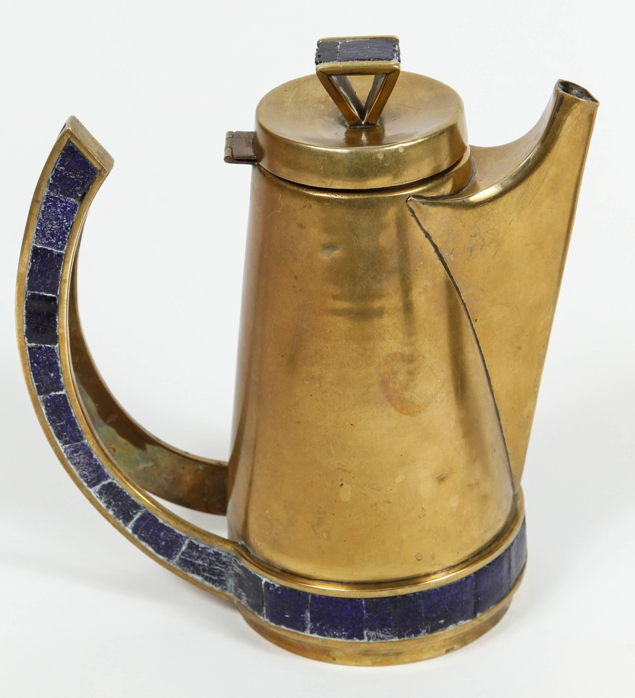 Mid-Century coffee set with pot, cream and sugar. Brass with inlay of blue glass hand-wrought in Mexico by Salvador Teran.