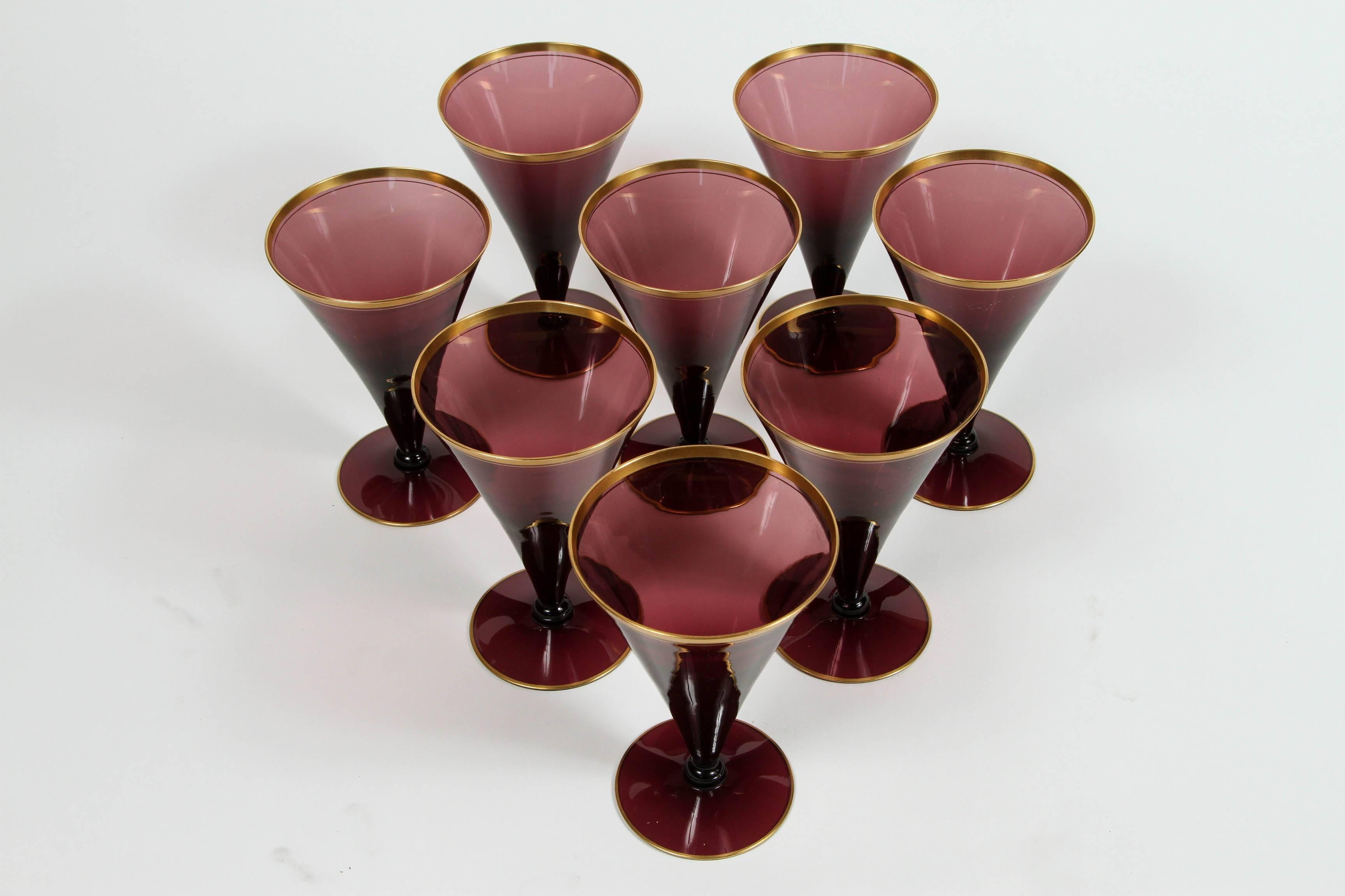 Set of eight antique amethyst sherry wine trumpet glass 19th century stemware with gold rims.

 