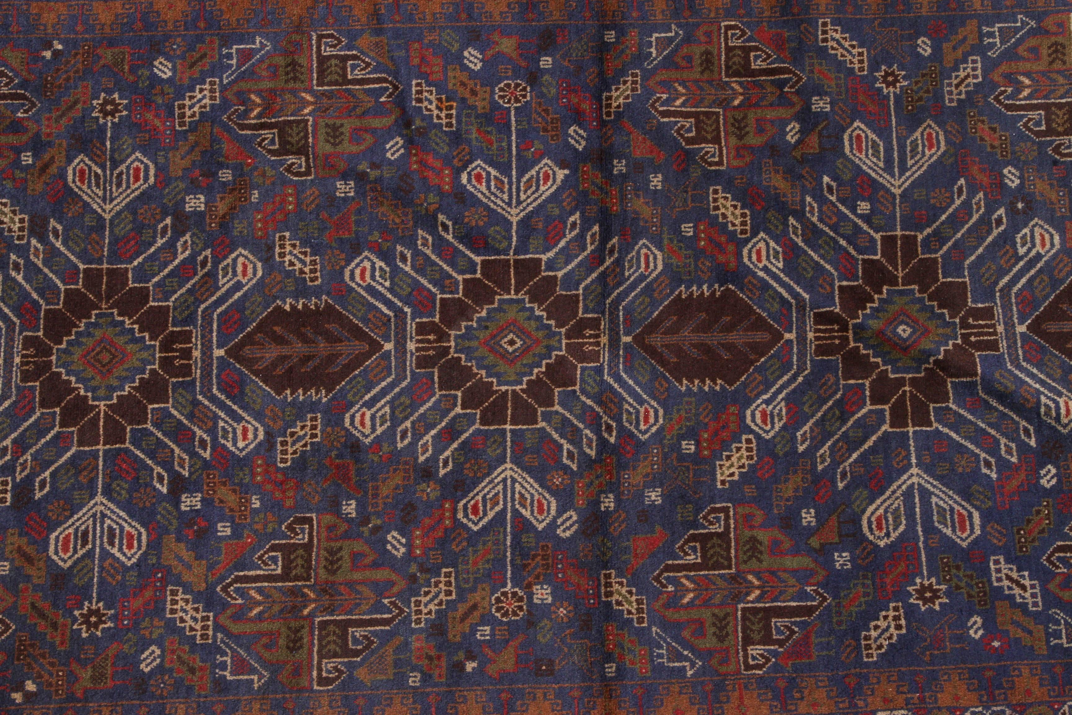 Tribal Floral Antique Persian Baluchi Rug For Sale