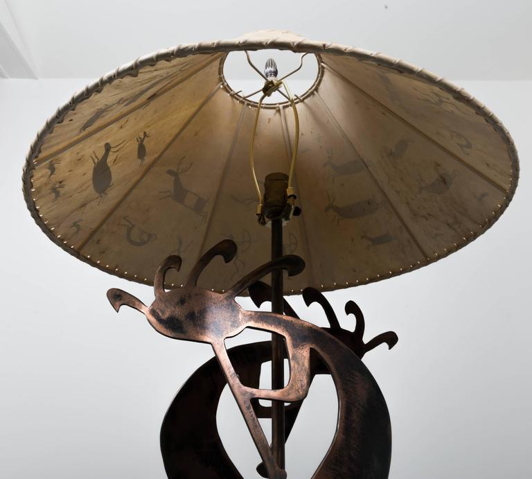 Copper Table Lamp With Stylized Native American Motifs And Leather Copper Table Lamp Pair Of Stylized Ians On Freeform Base Hand Painted Shade