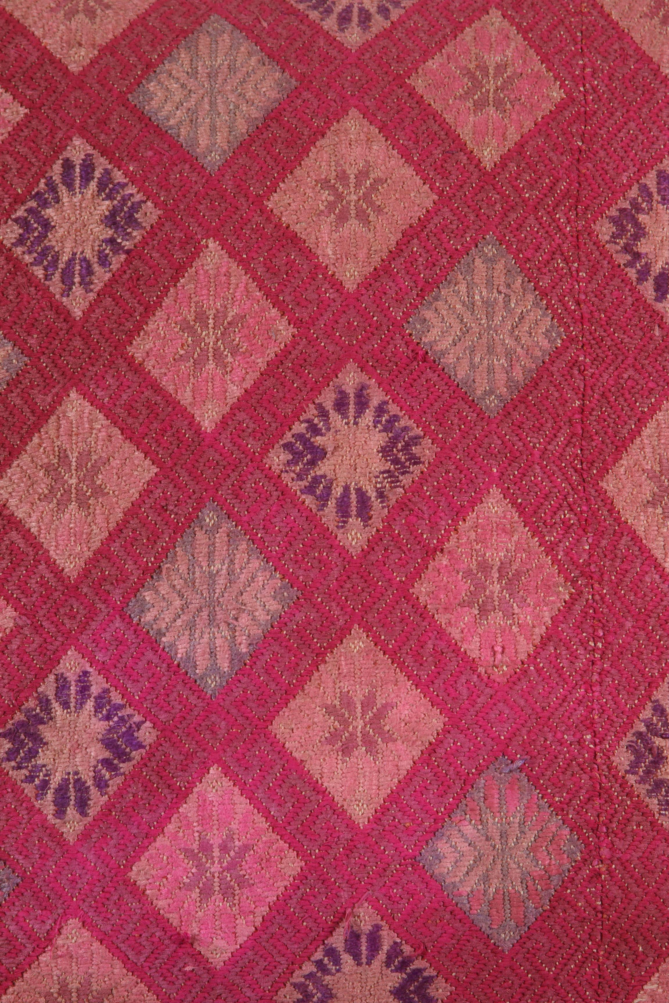 Hand loomed cotton on cotton brocade “marriage quilt”.   Mhong Tribal textile.   Backed with natural linen, feather and down fill, invisible zipper.  Two available.