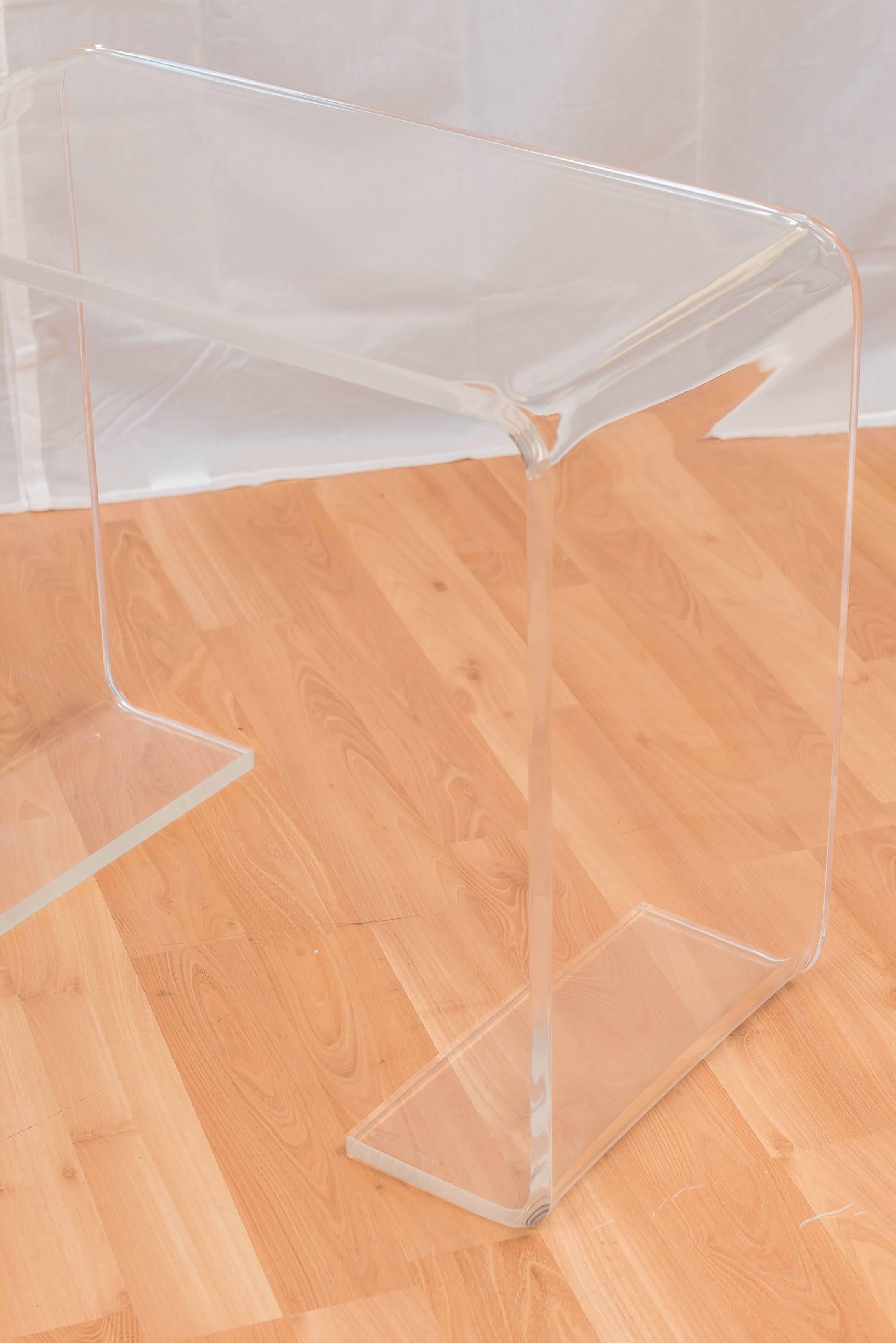Stylish pair Les Prismatiques lucite end tables with waterfall edges, stamped on bottom lip. 